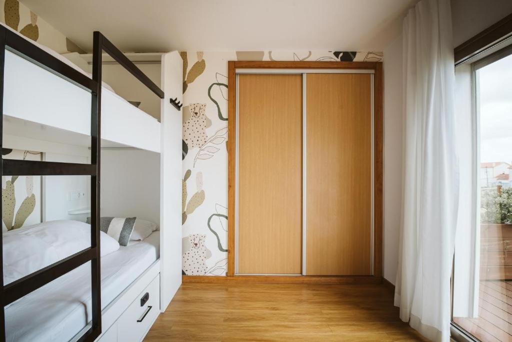Single Bed in Dormitory Room