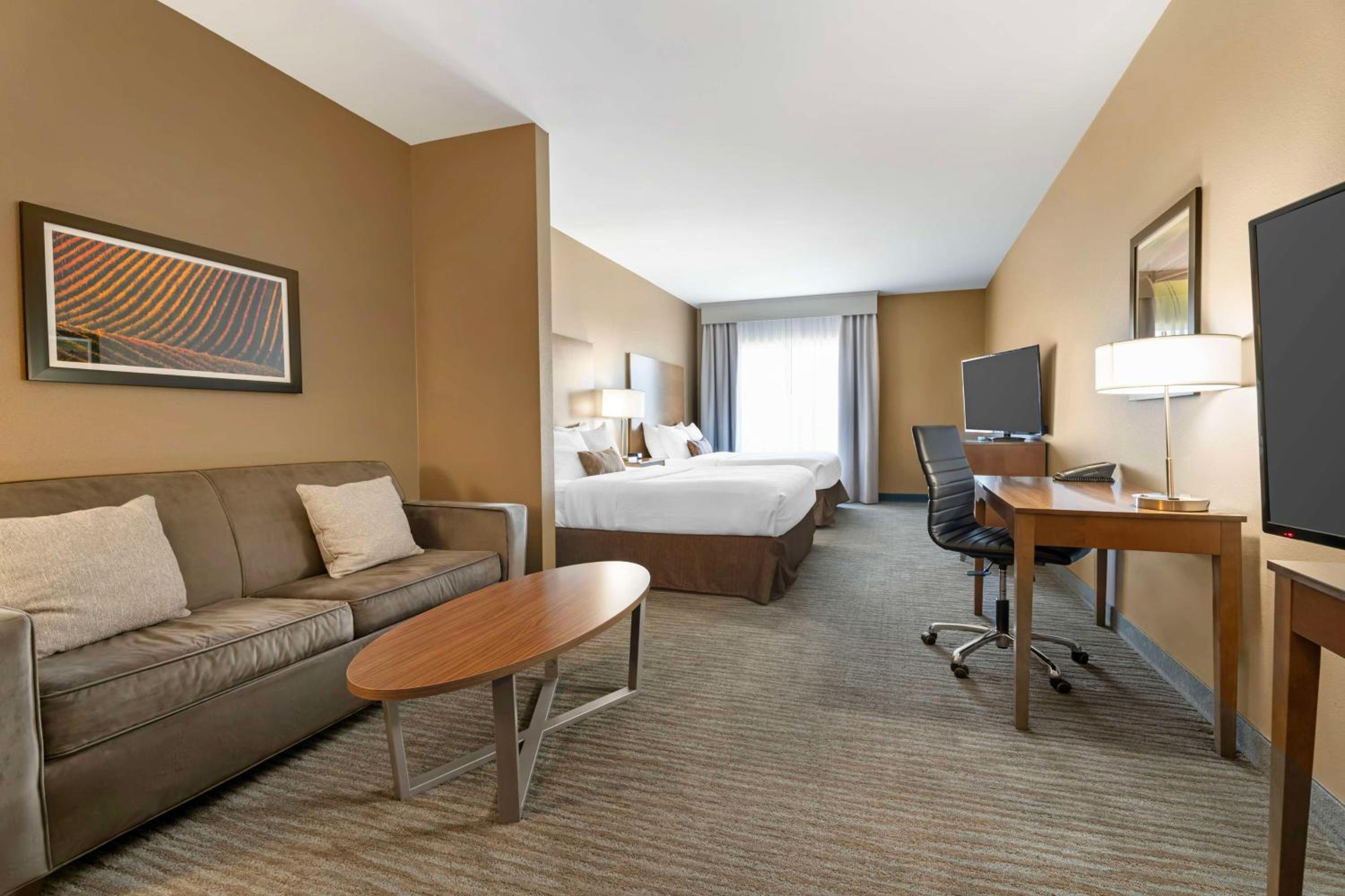 Queen Suite with Two Queen Beds with Sofa Bed - Photo 1