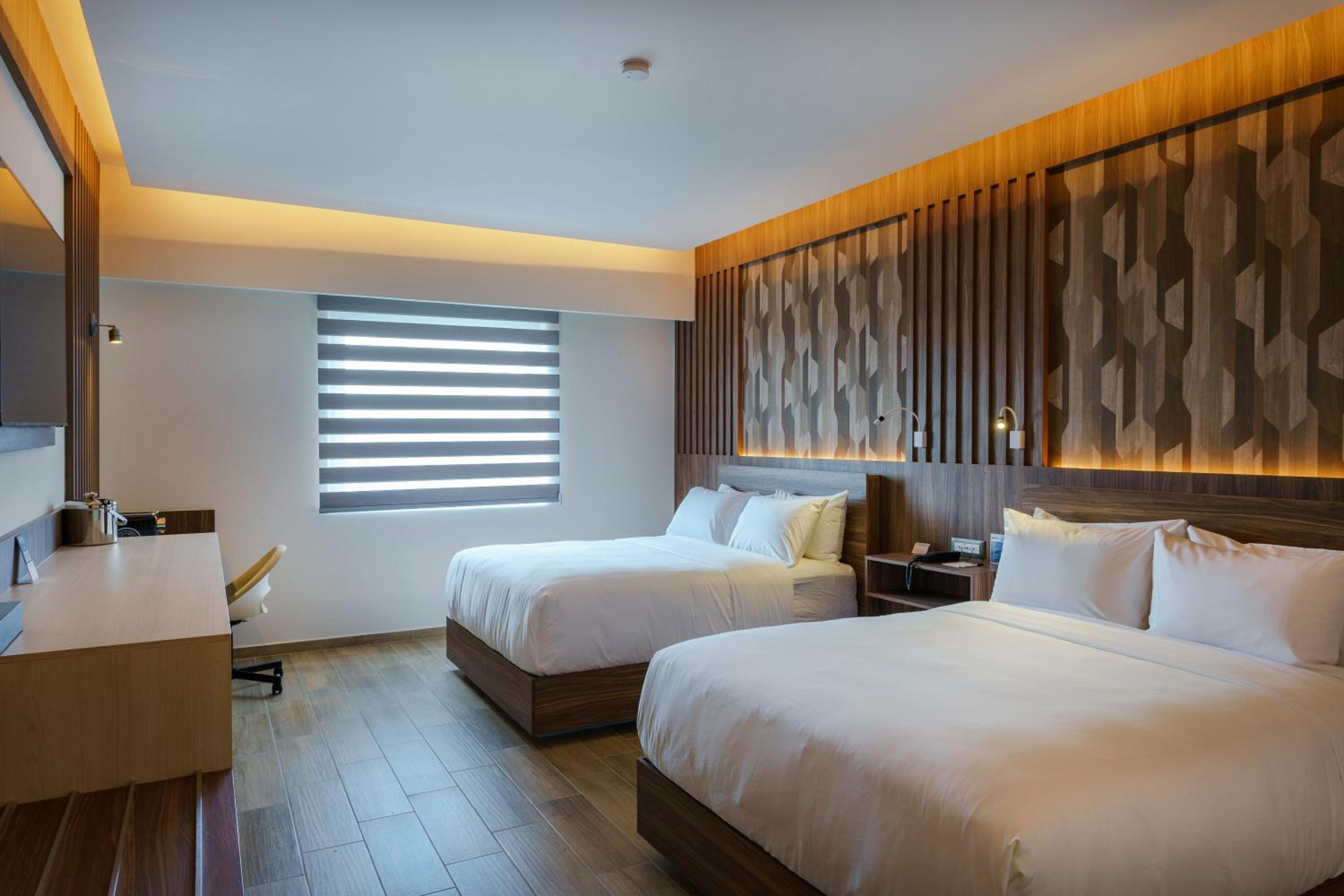 Quadruple Room with Two Queen Beds - Disability Access/Non Smoking/Interior Hall - Photo 1