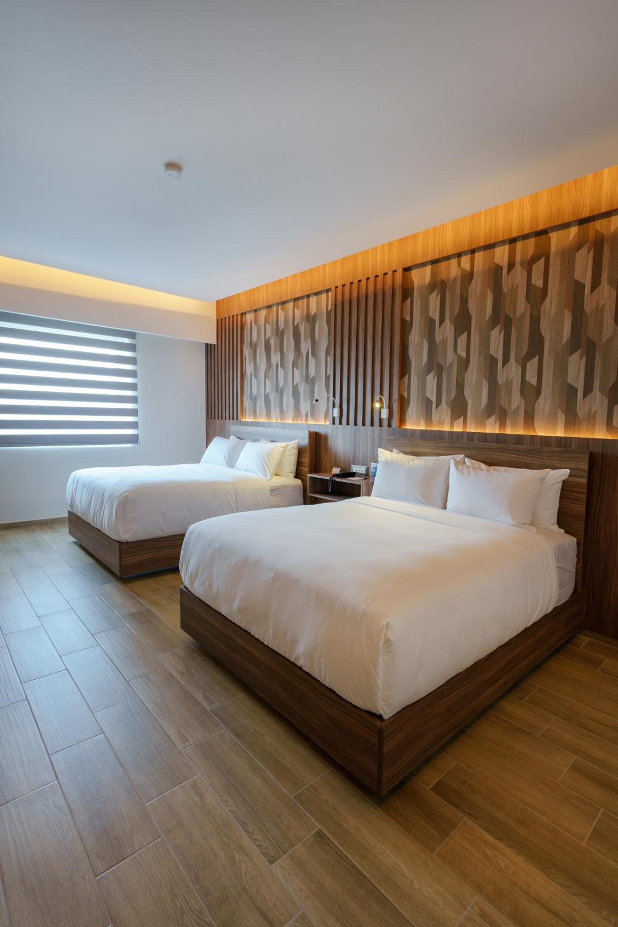 Queen Suite with Two Queen Beds - Non Smoking/Interior Hall - Photo 1