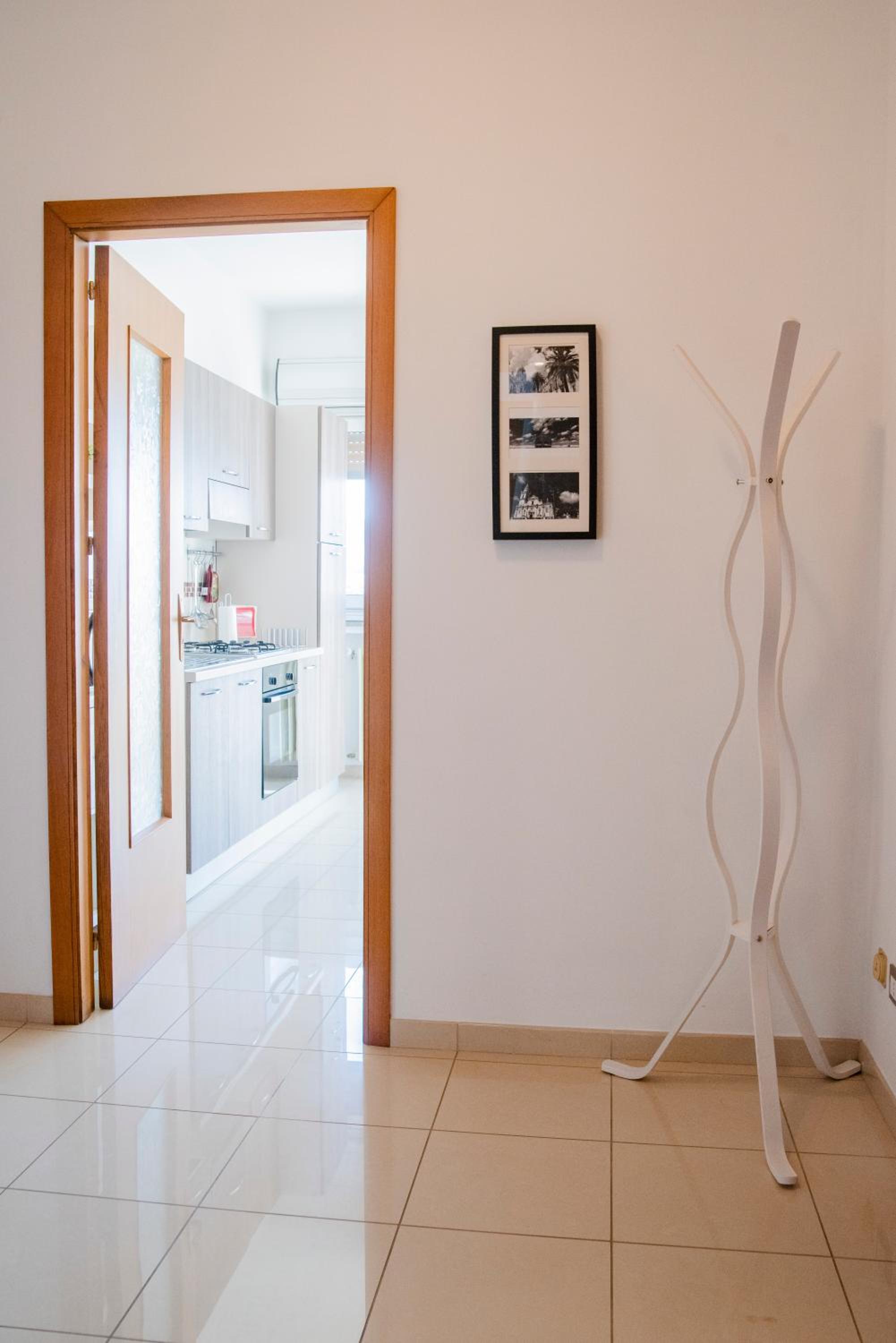 Four-Bedroom Apartment with Balcony 