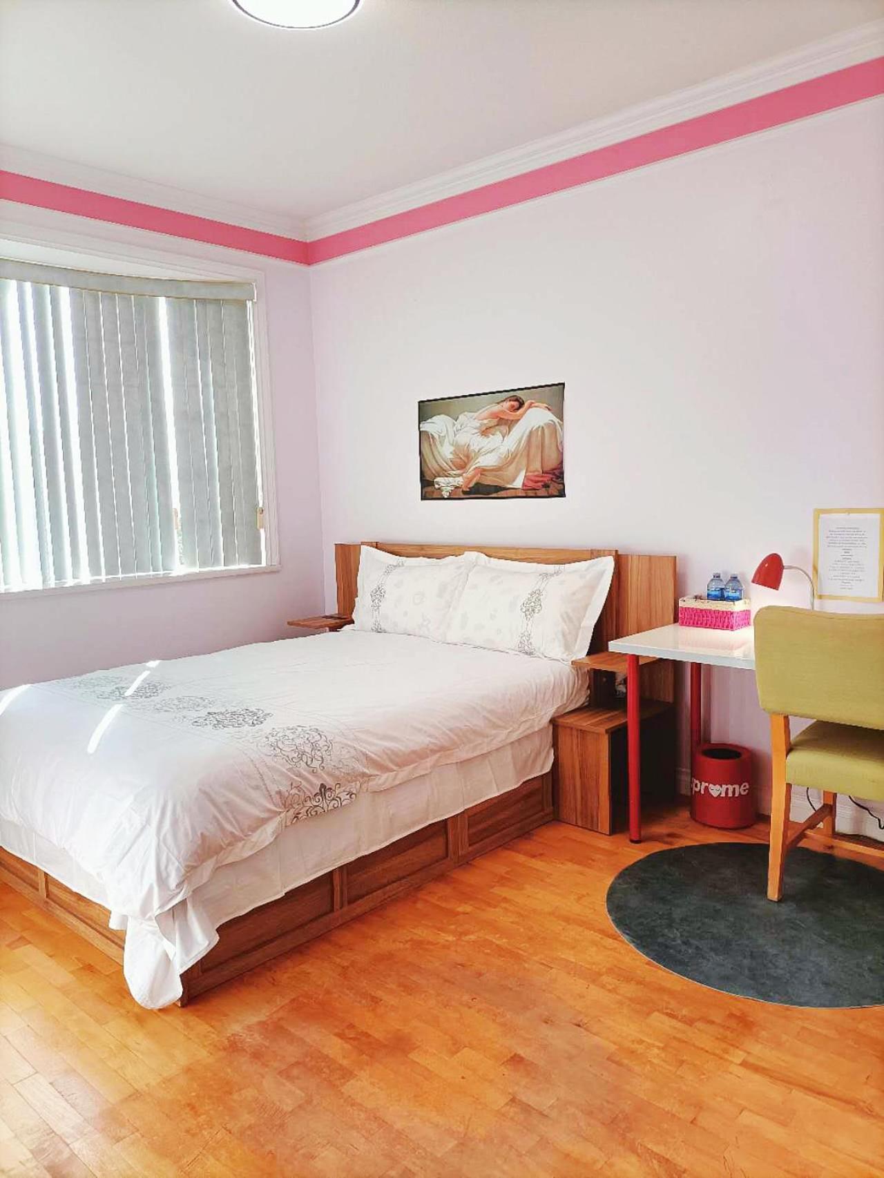 Queen Room with Shared Bathroom