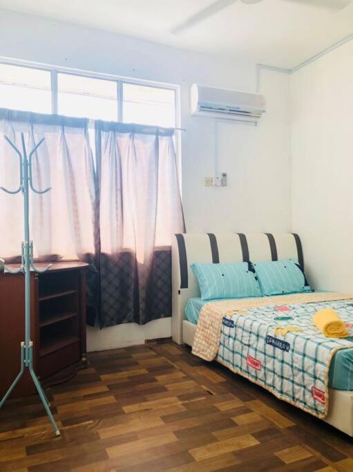 Three-Bedroom Apartment photo 2