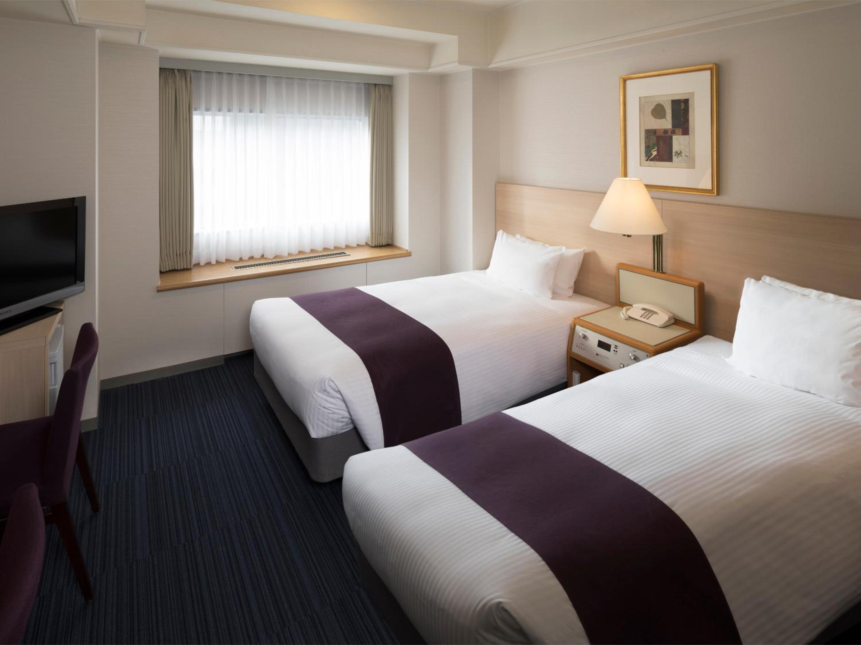 Room Selected at Check-In - Twin Room - Photo 1