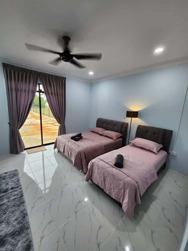 Deluxe Double Room (2 Adults + 1 Child) photo 2