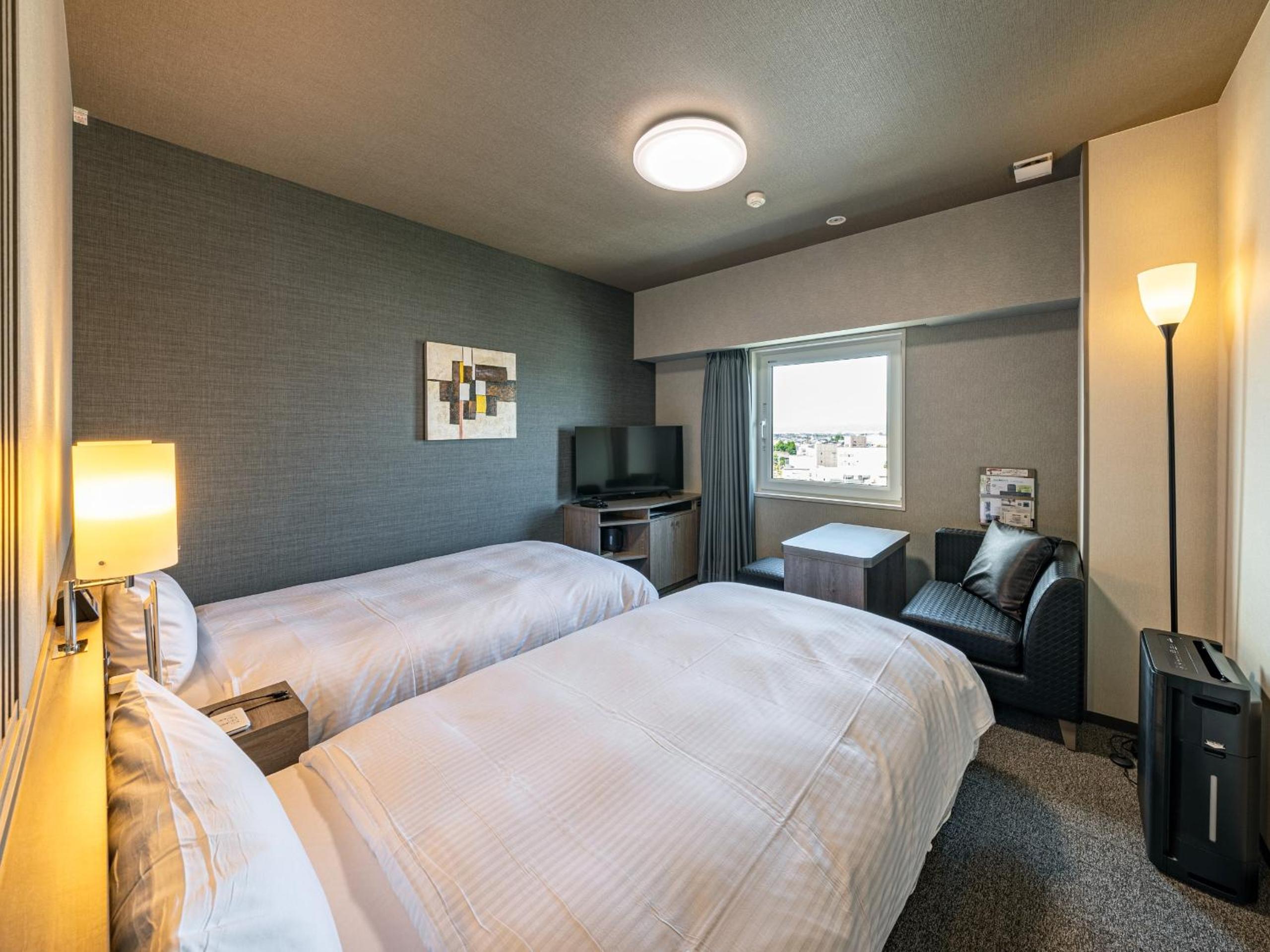 Twin Room - Non-Smoking - Photo 1