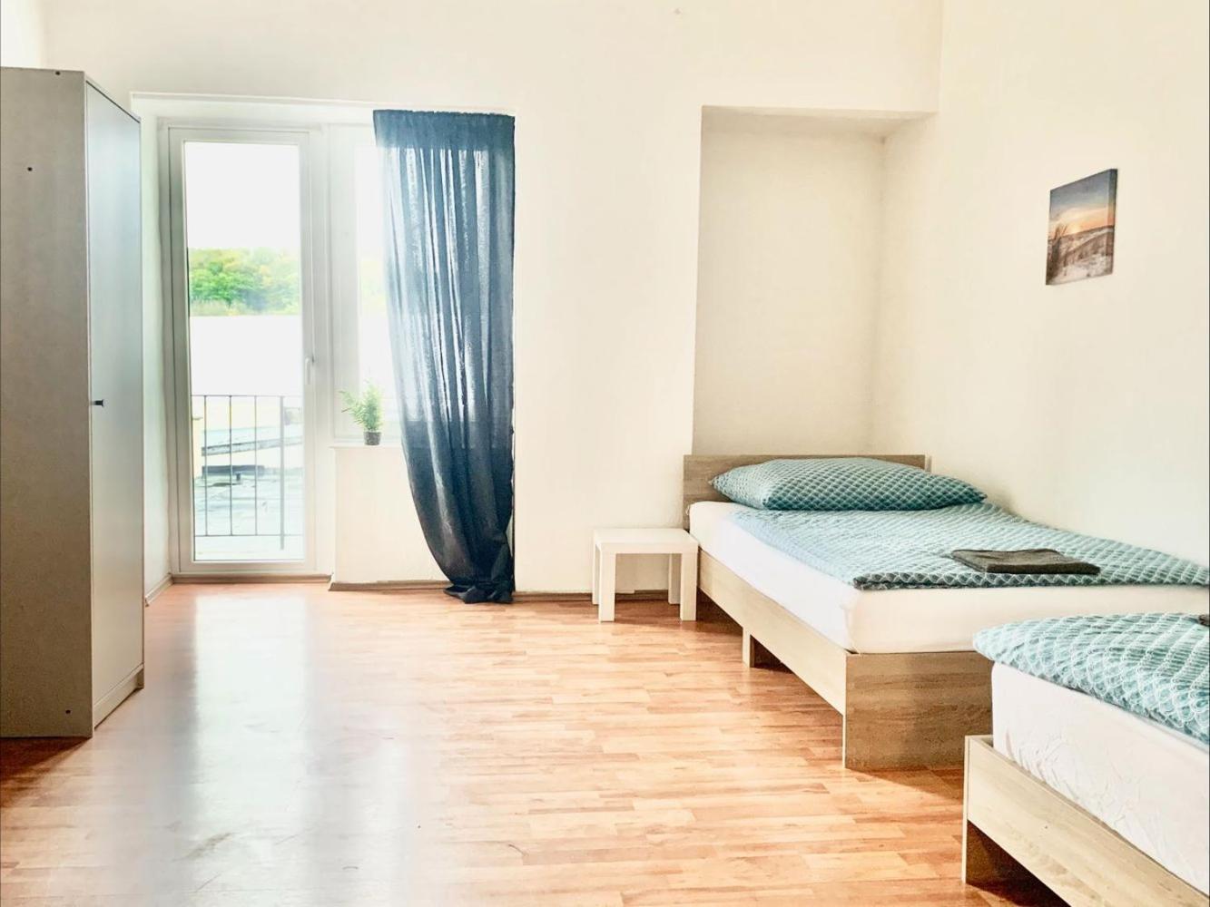 Three-Bedroom Apartment with Balcony photo 1
