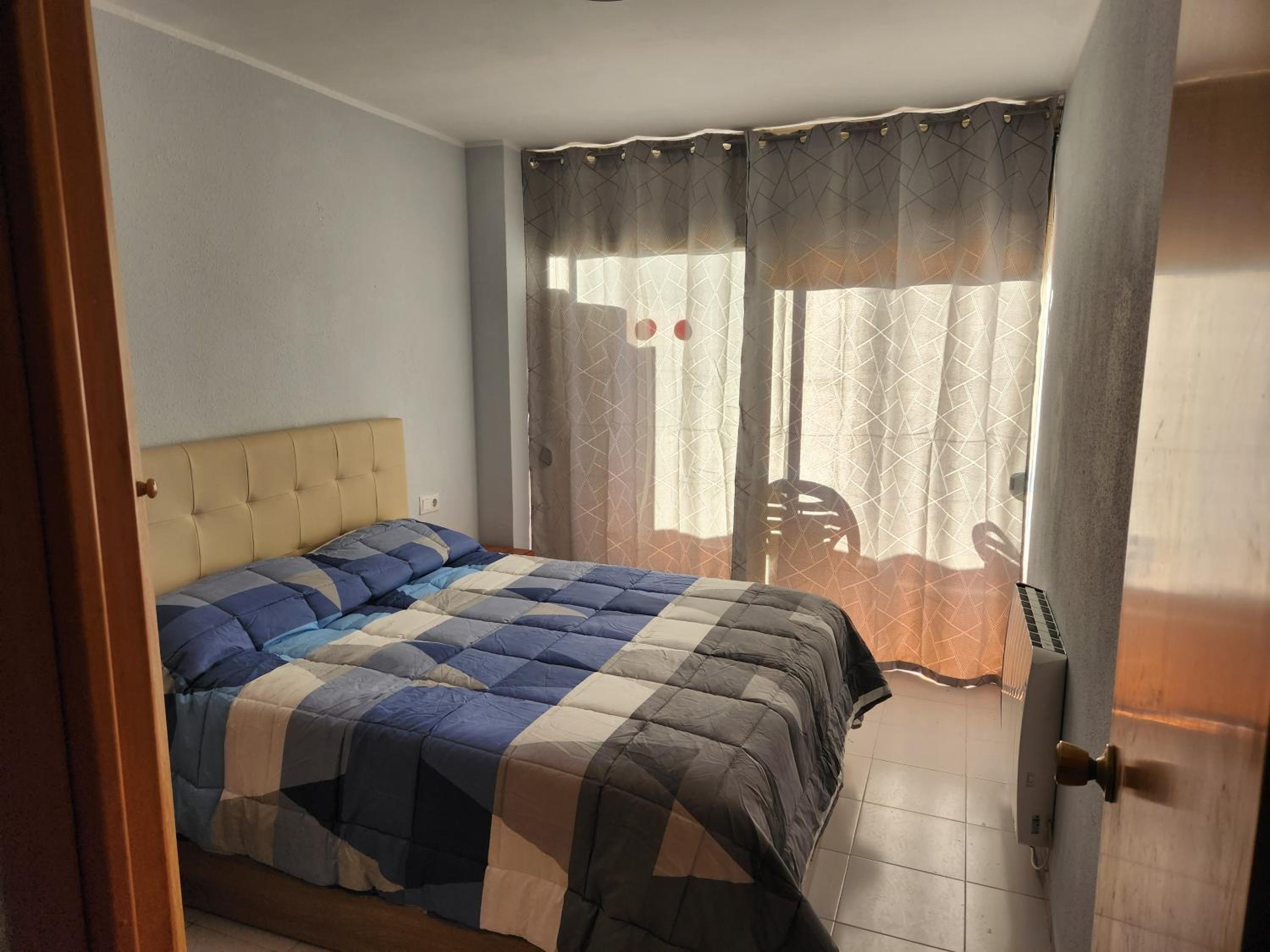Apartamento de un dormitorio superior con balcón
