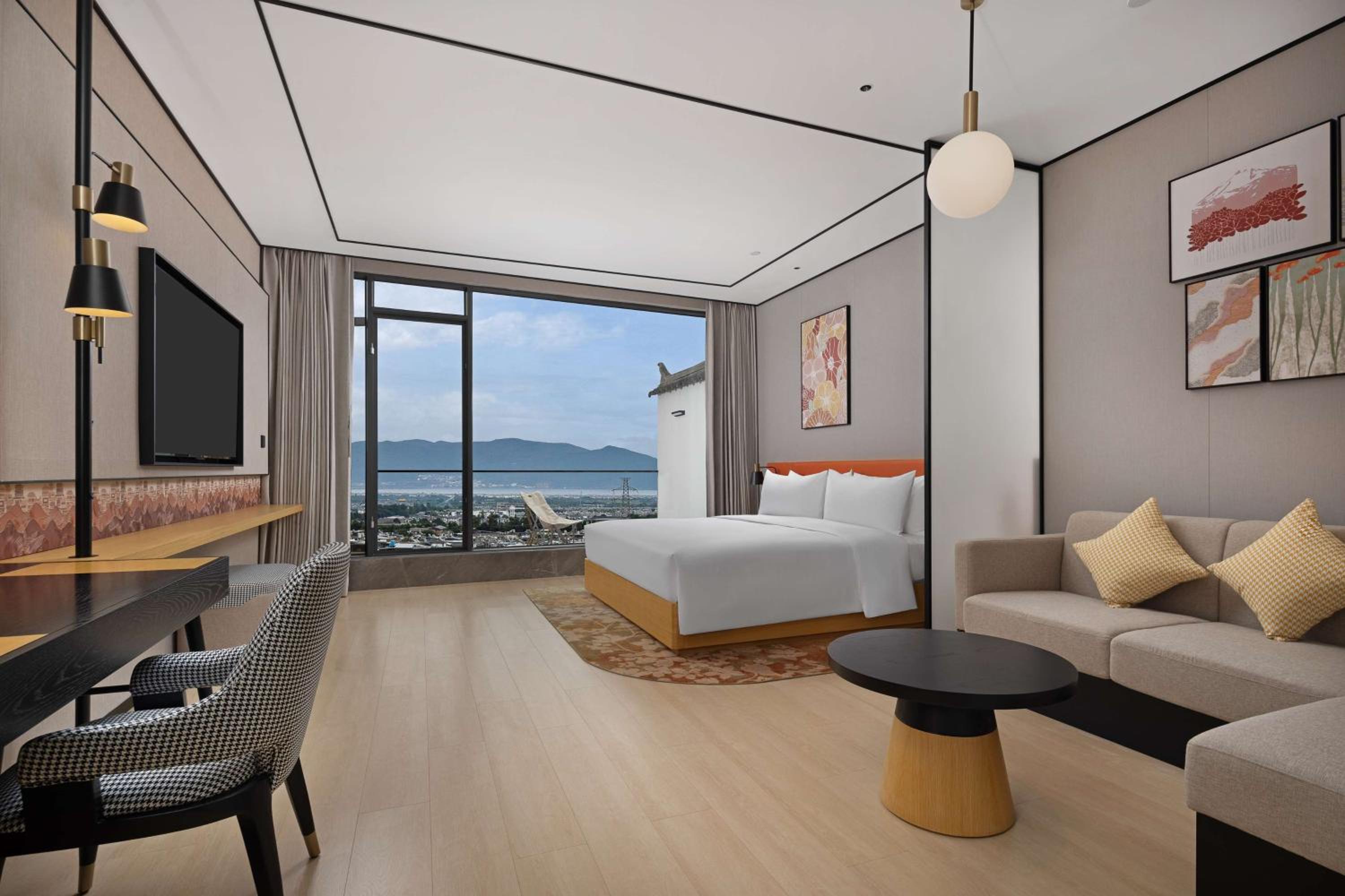Premium King Room with Sofa Bed photo 3
