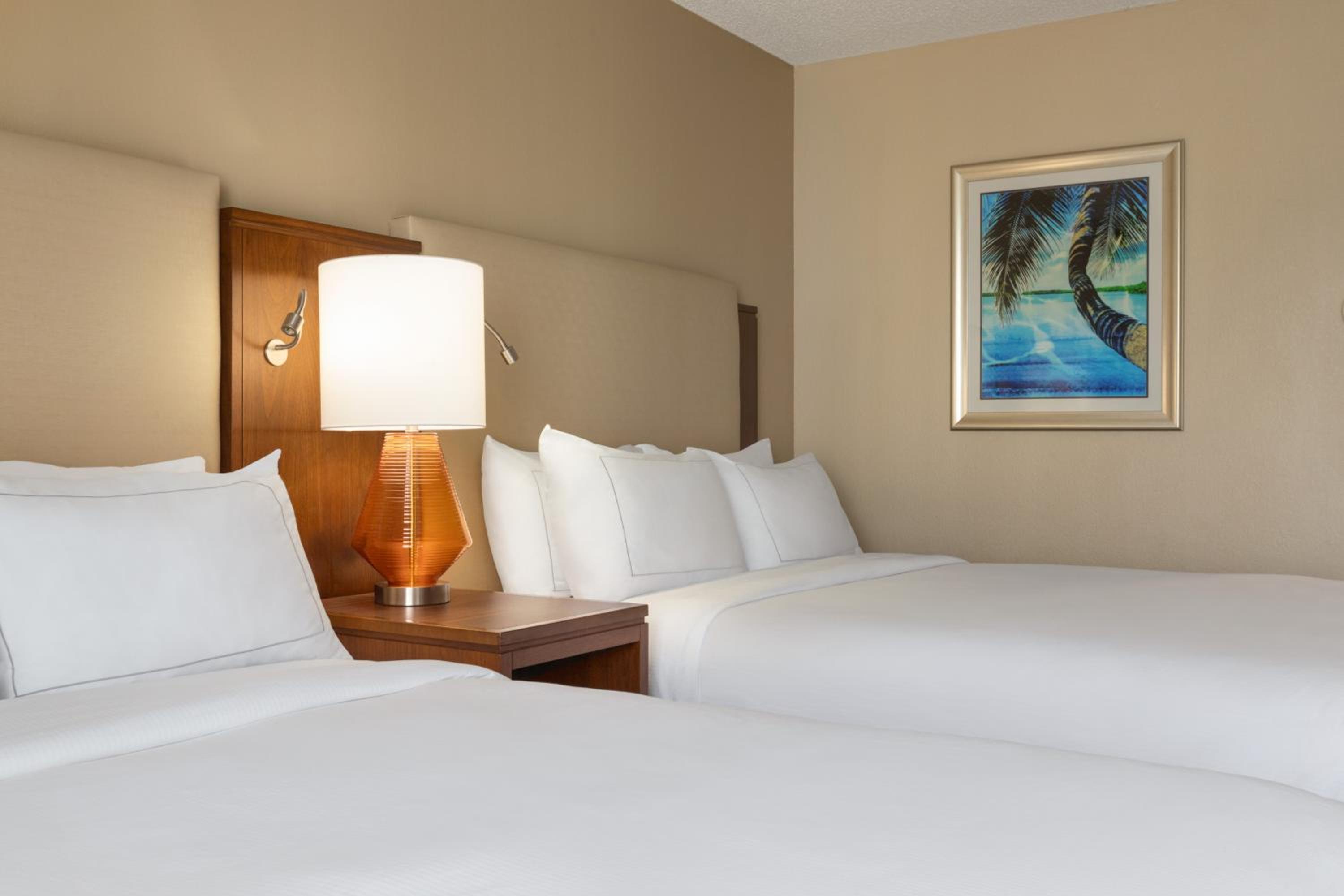 Queen Room with Two Queen Beds - Photo 1