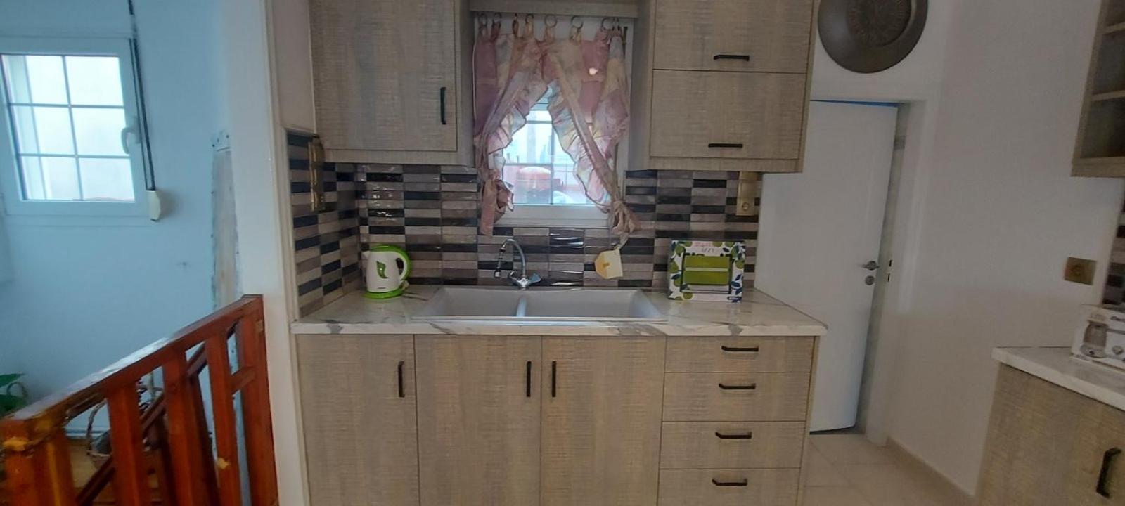 Three-Bedroom House - Photo 31
