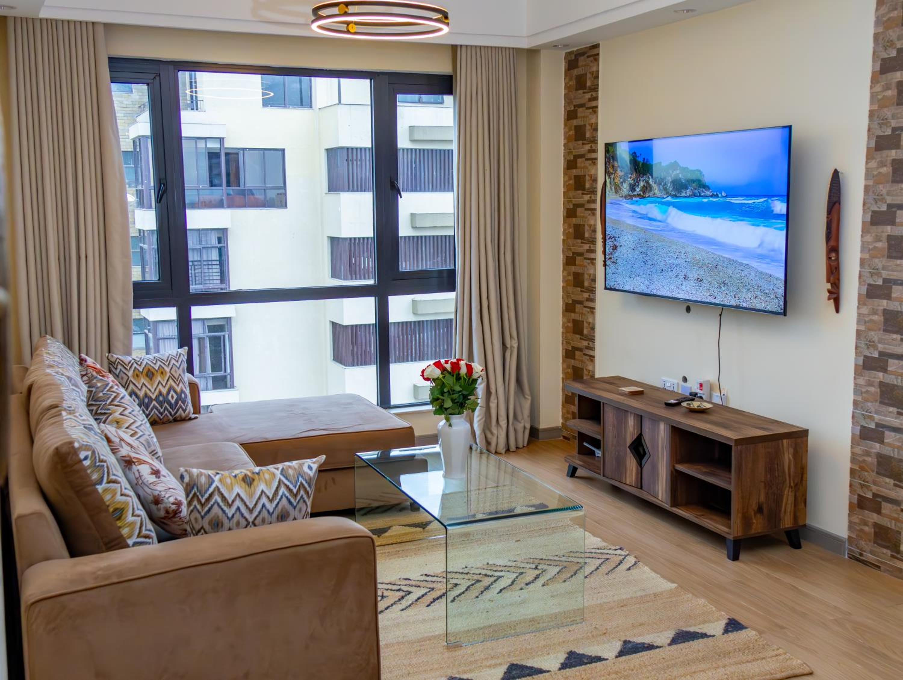 One-Bedroom Apartment with Balcony and City View