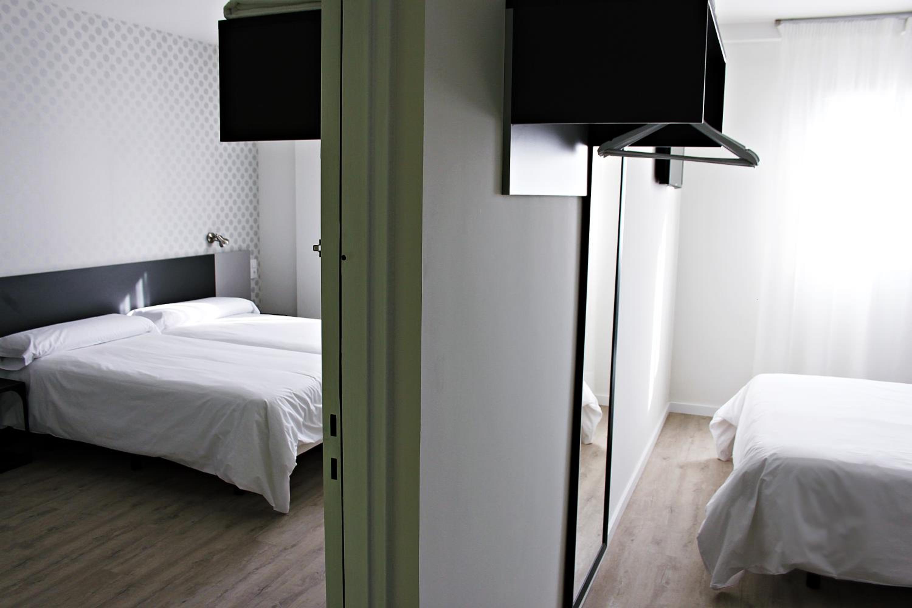 Dos habitaciones dobles conectadas