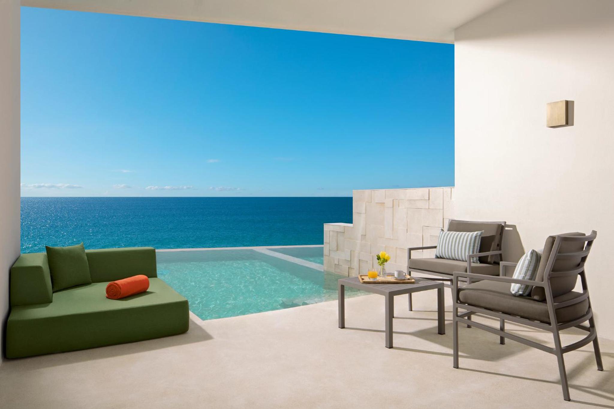 Relax on your private terrace with stunning ocean views!