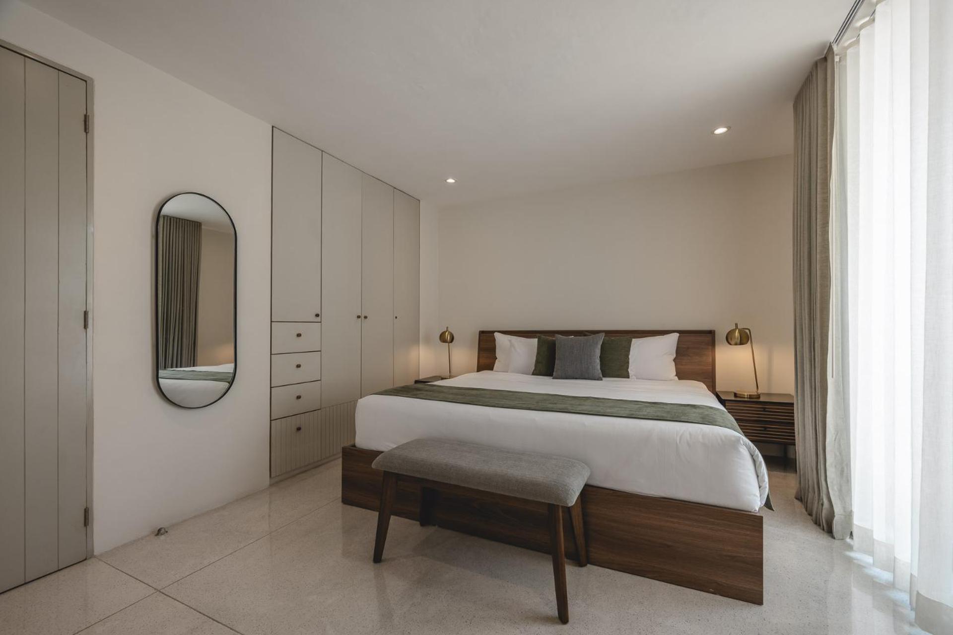 One-Bedroom Apartment with Balcony and City View