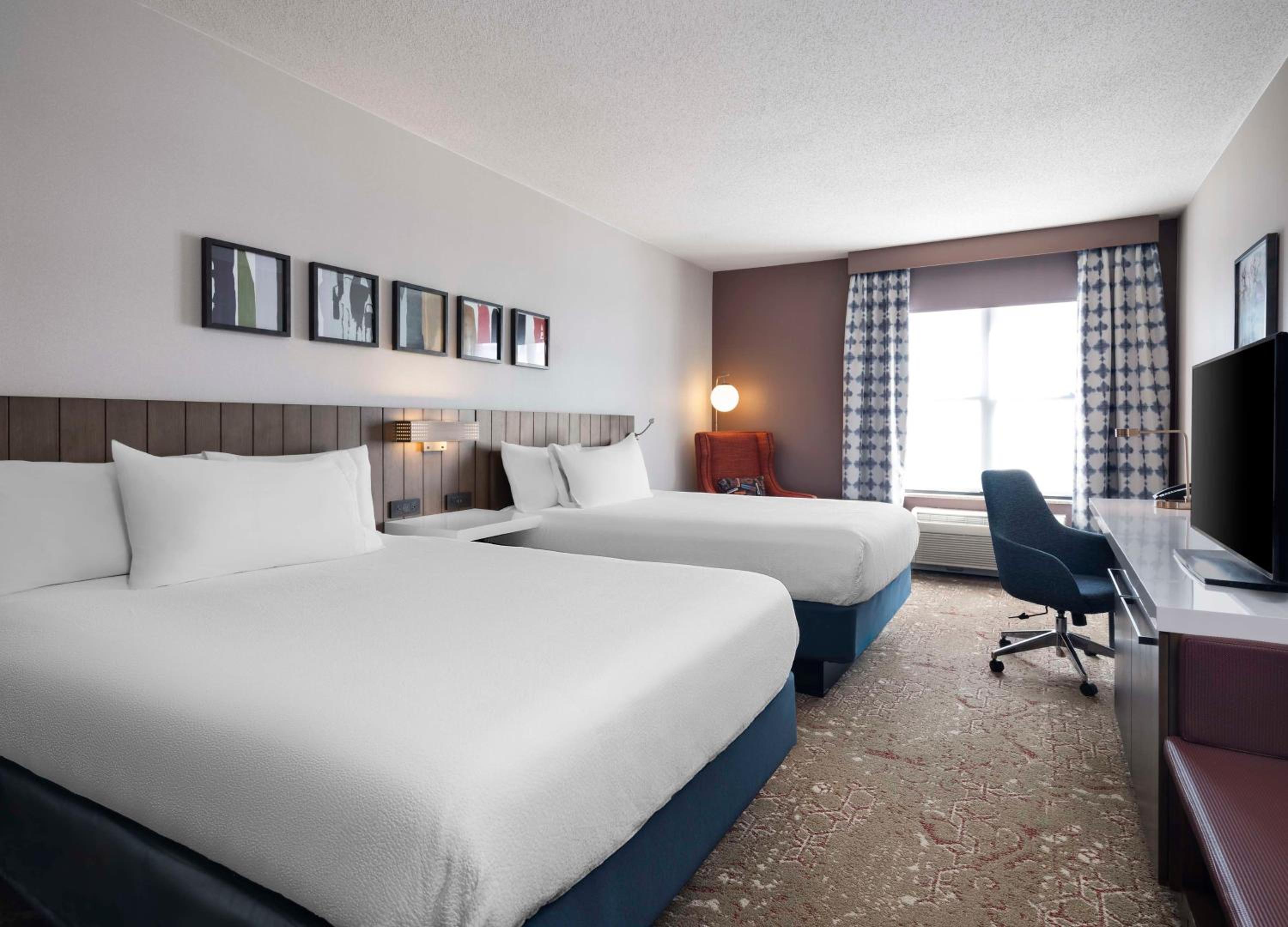 Premium Queen Room with Two Queen Beds - Photo 1