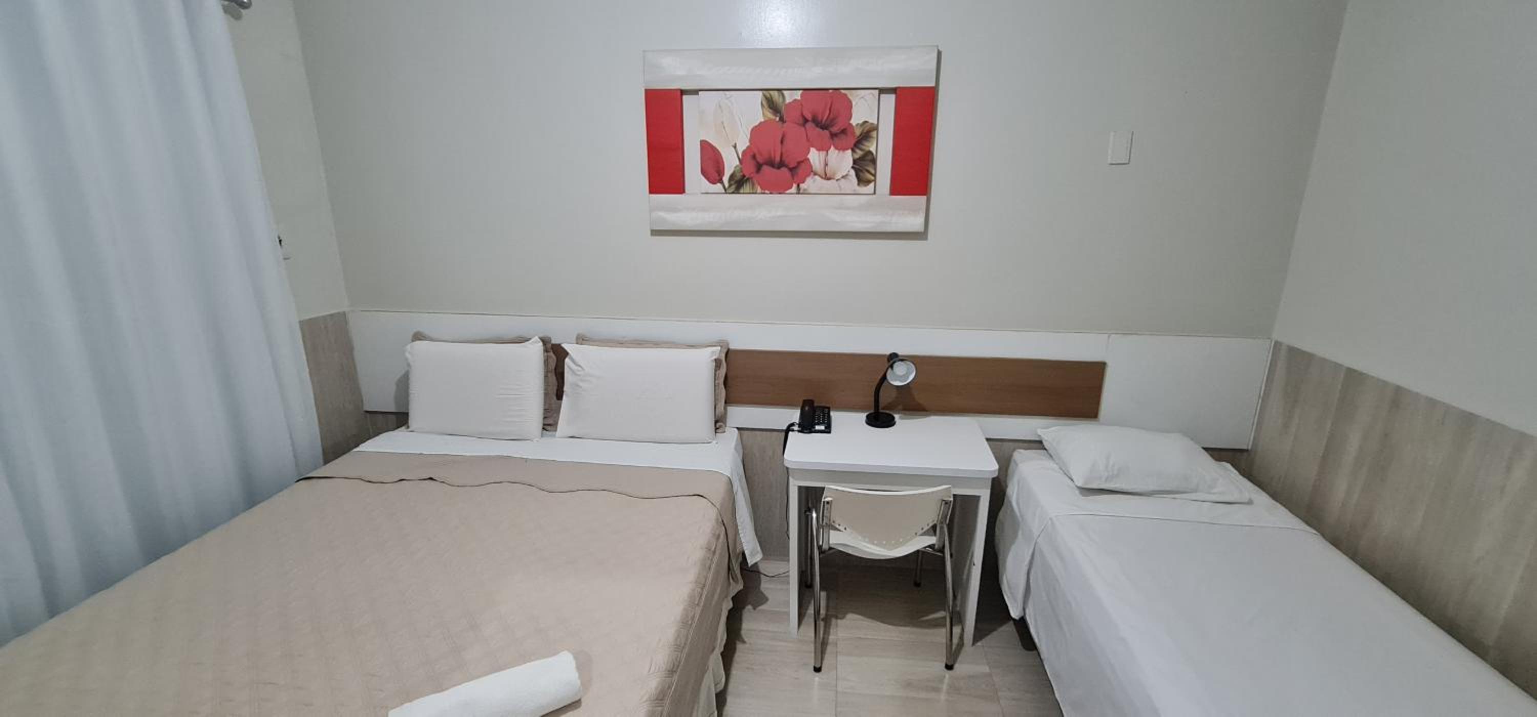 Deluxe Triple Room - Photo 12