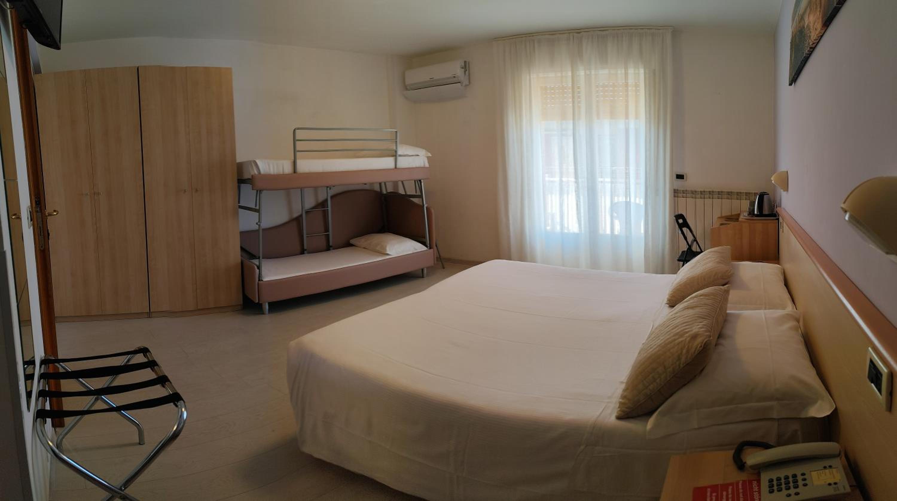 Quadruple Room with Balcony
