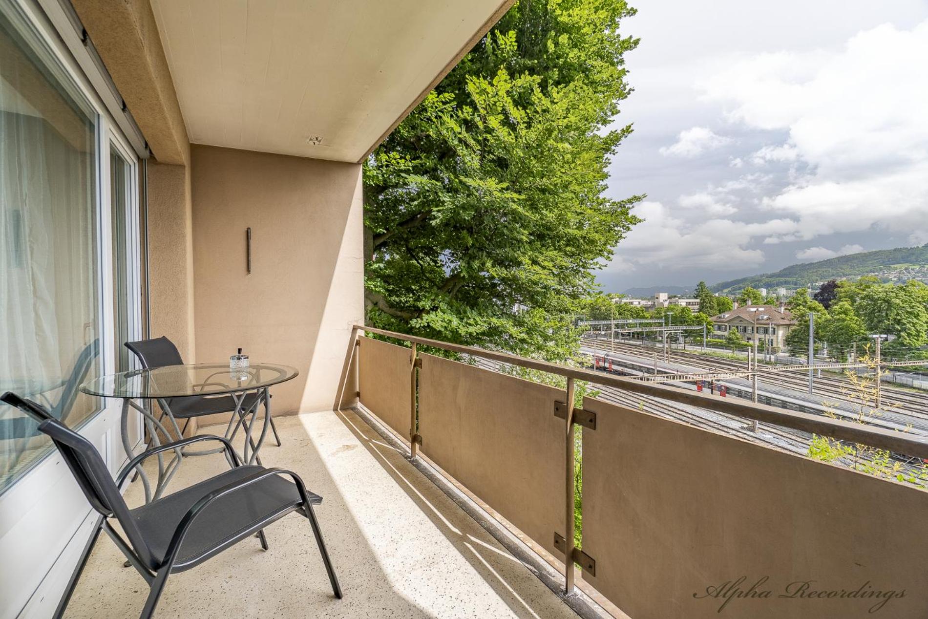 Three-Bedroom Apartment With Balcony photo 1