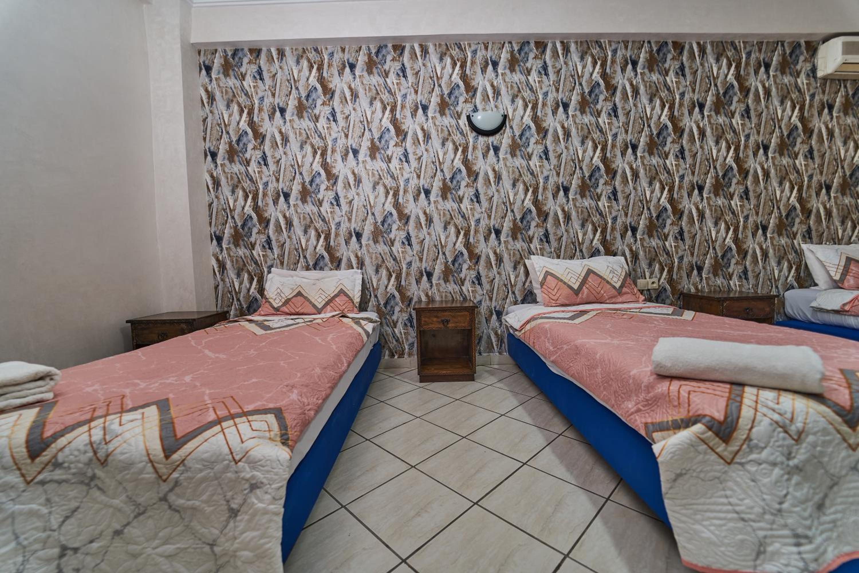 Single Bed In Female Dormitory Room