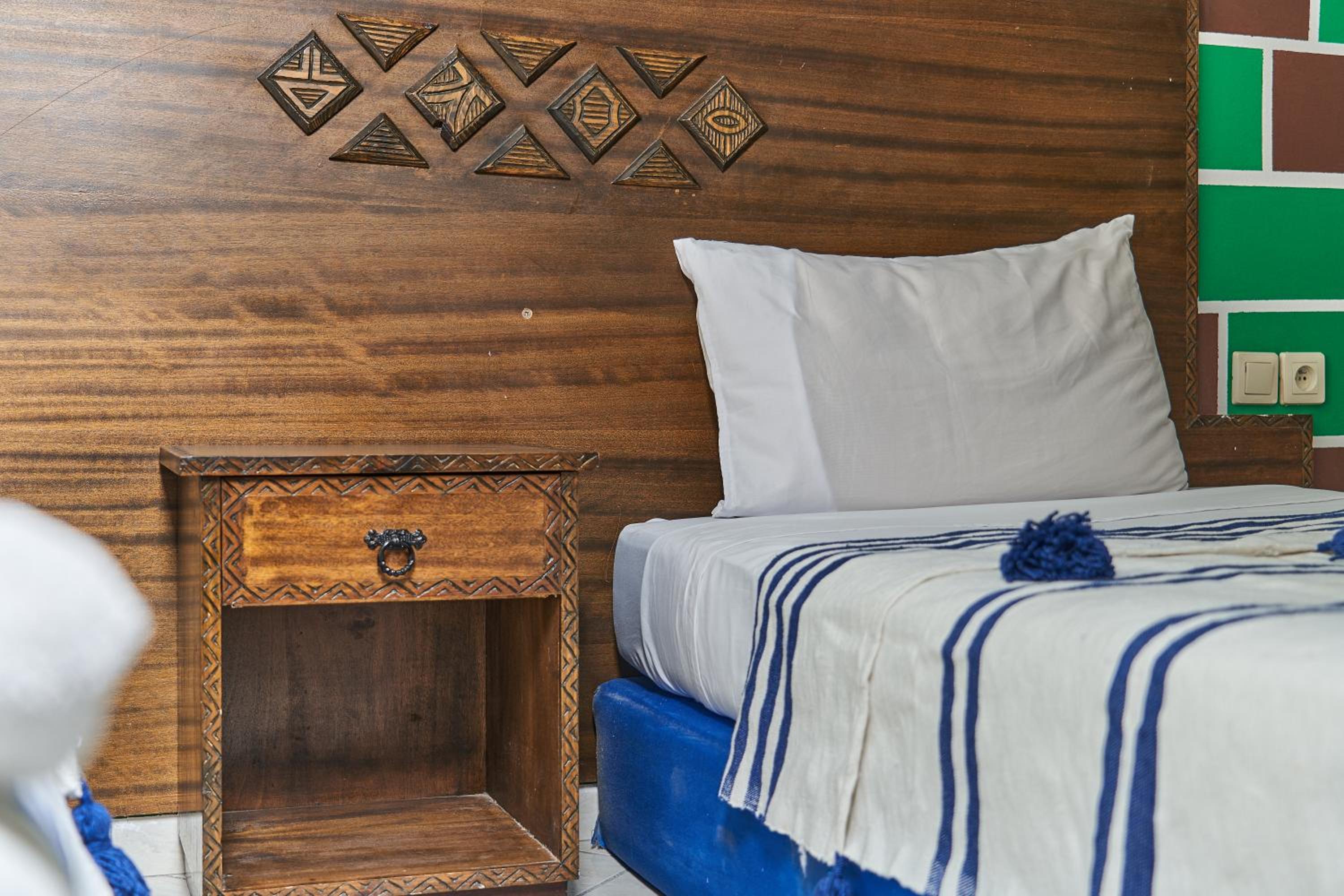Single Bed In Mixed Dormitory Room