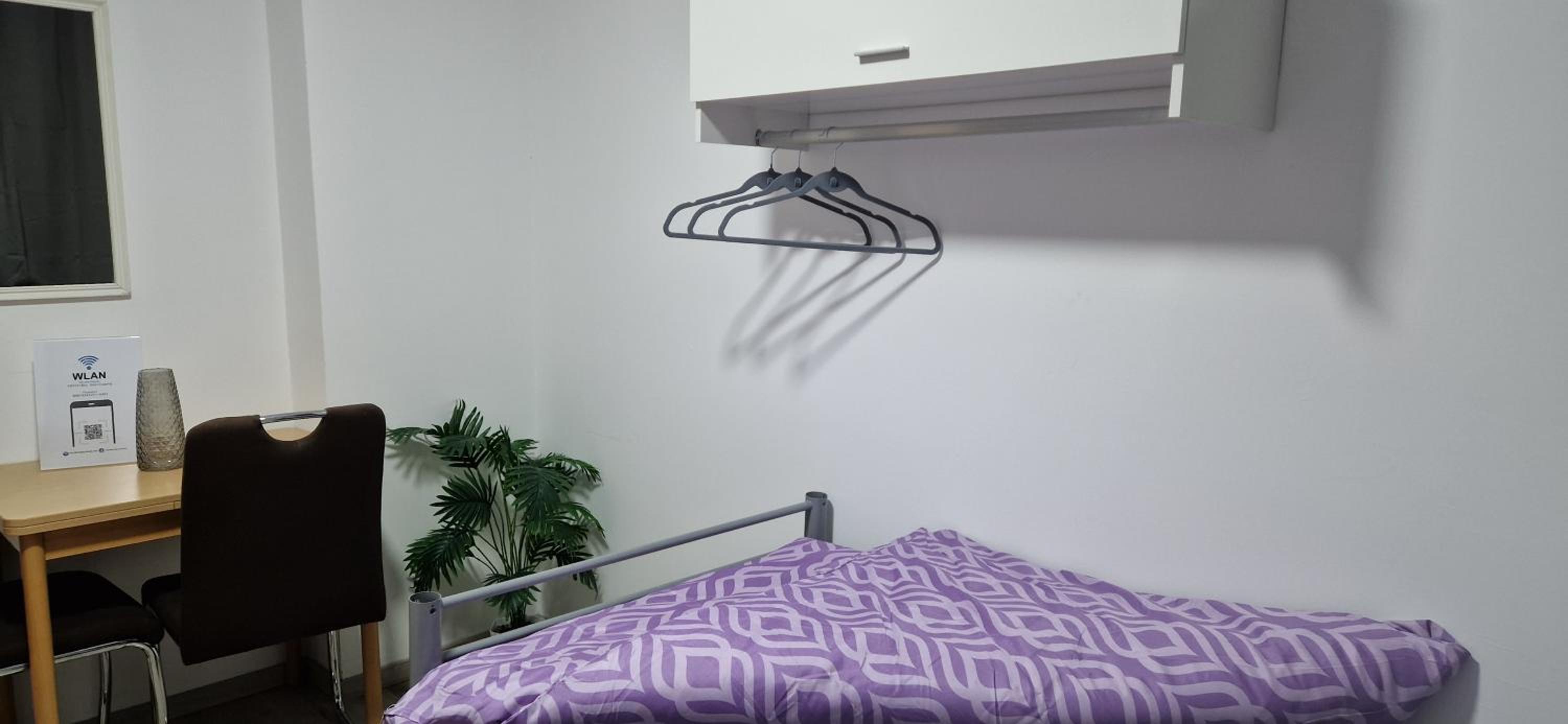 Three-Bedroom Apartment photo 2