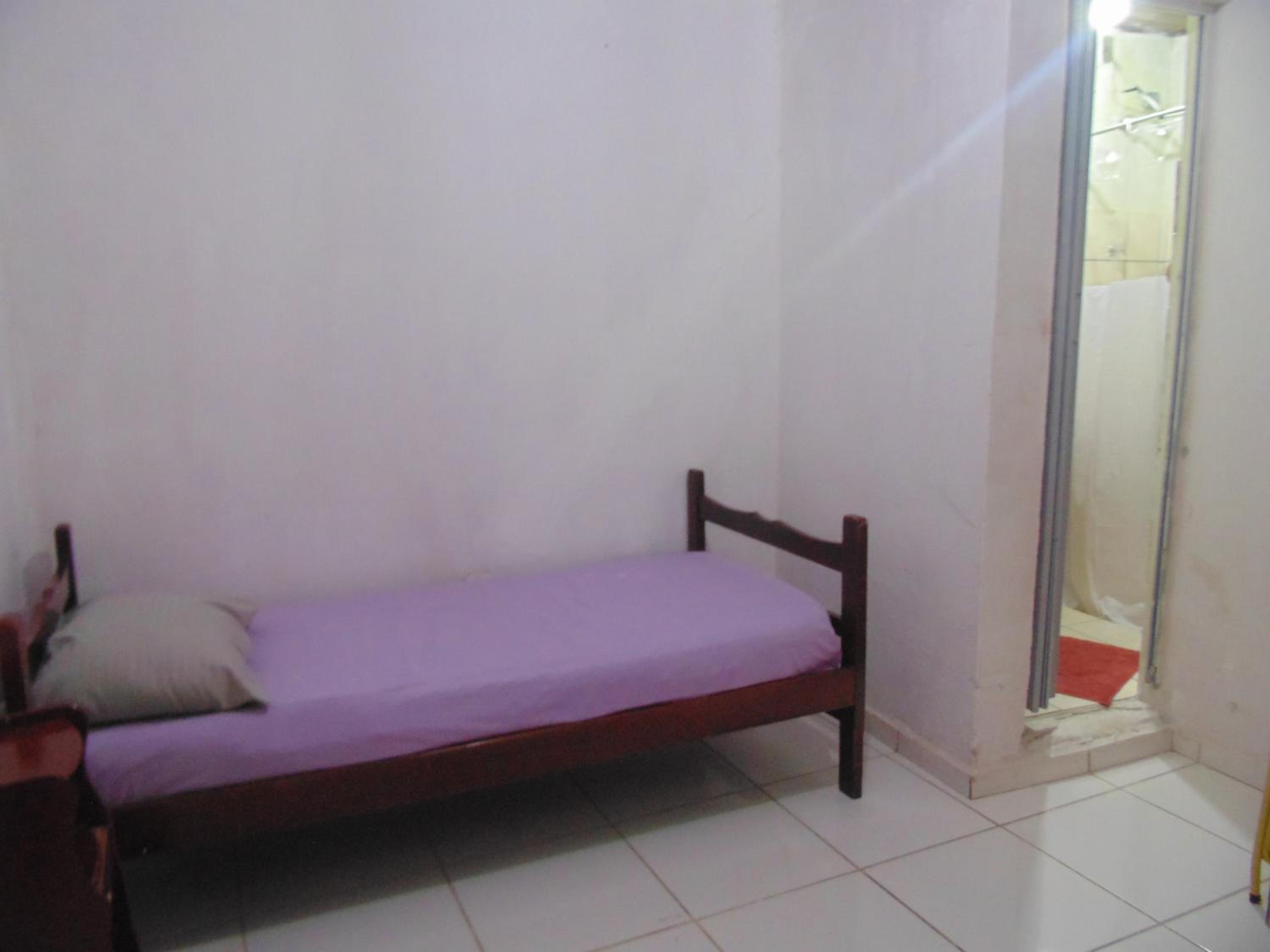 Single Bed In Dormitory Room photo 1