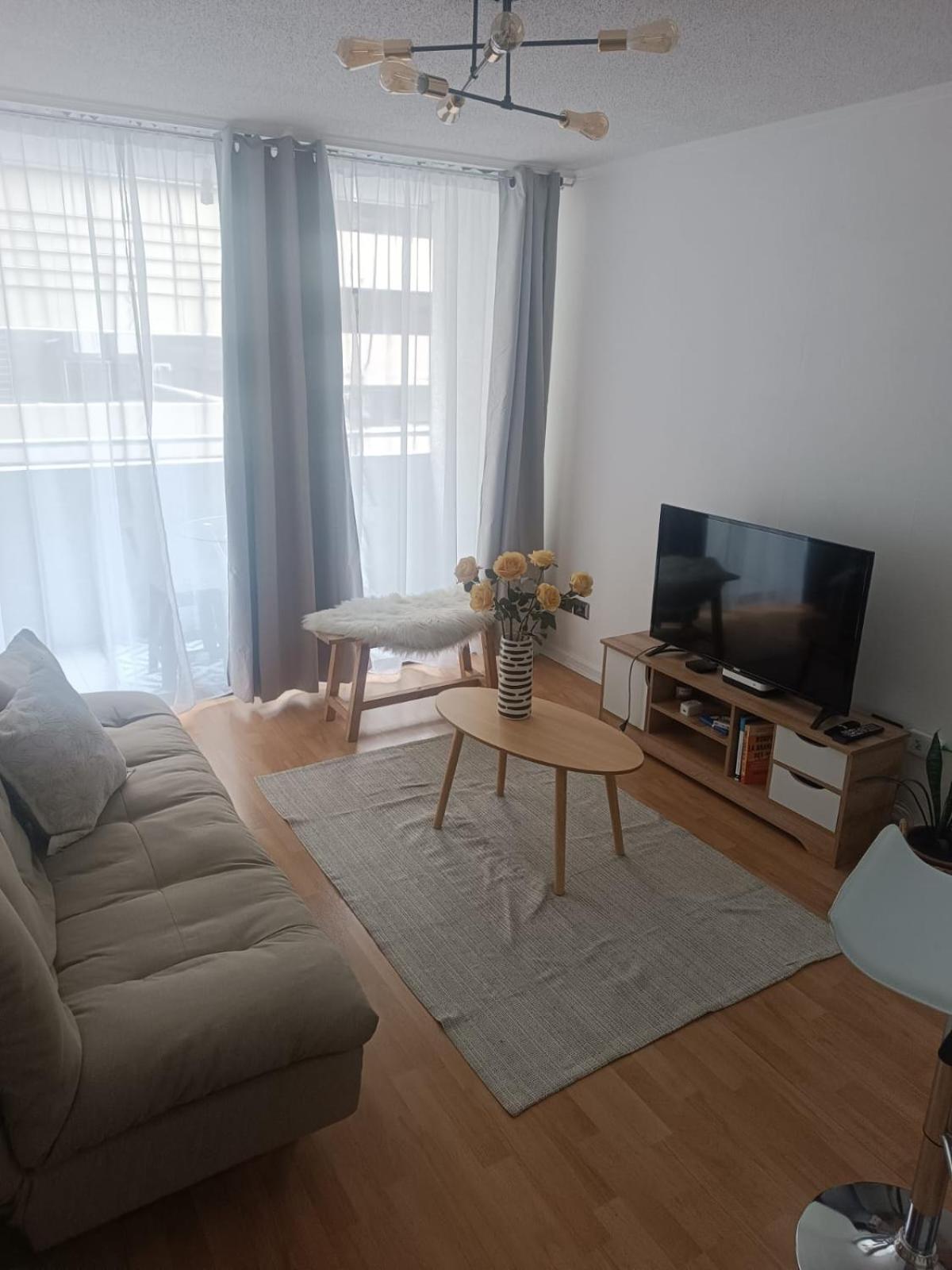 One-Bedroom Apartment with Balcony and City View