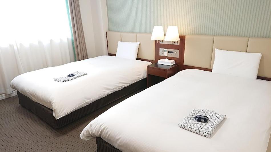 Twin Room - Non-Smoking photo 1
