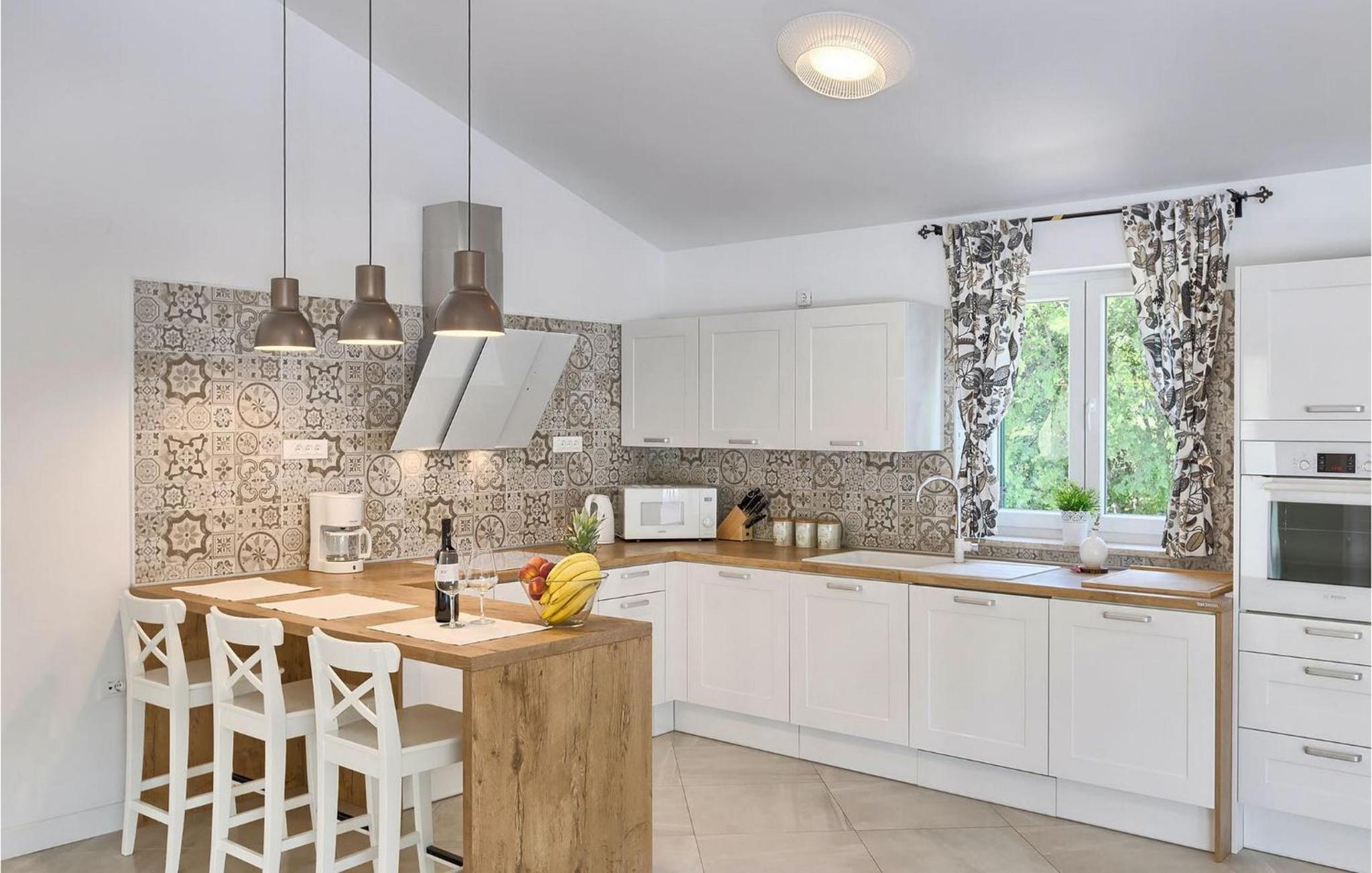 Four-Bedroom Holiday Home photo 3