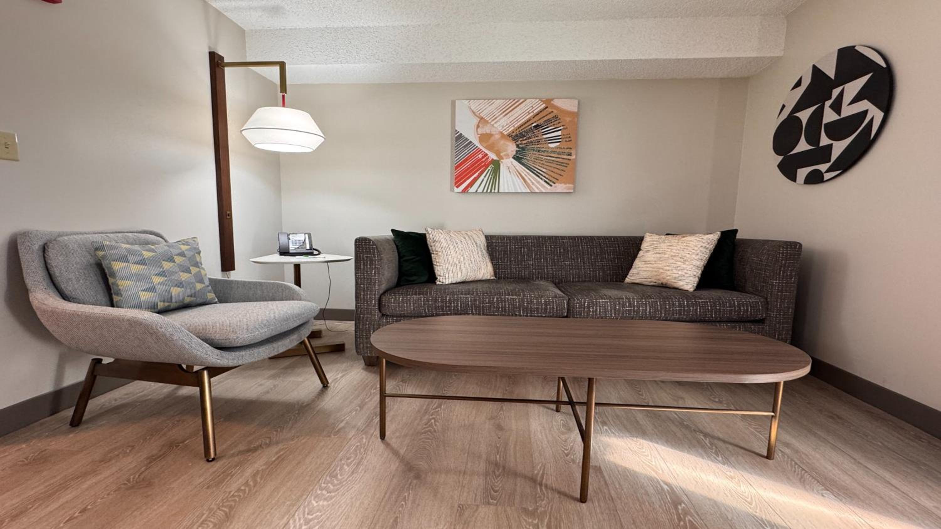 living room with a couch, chair and coffee table