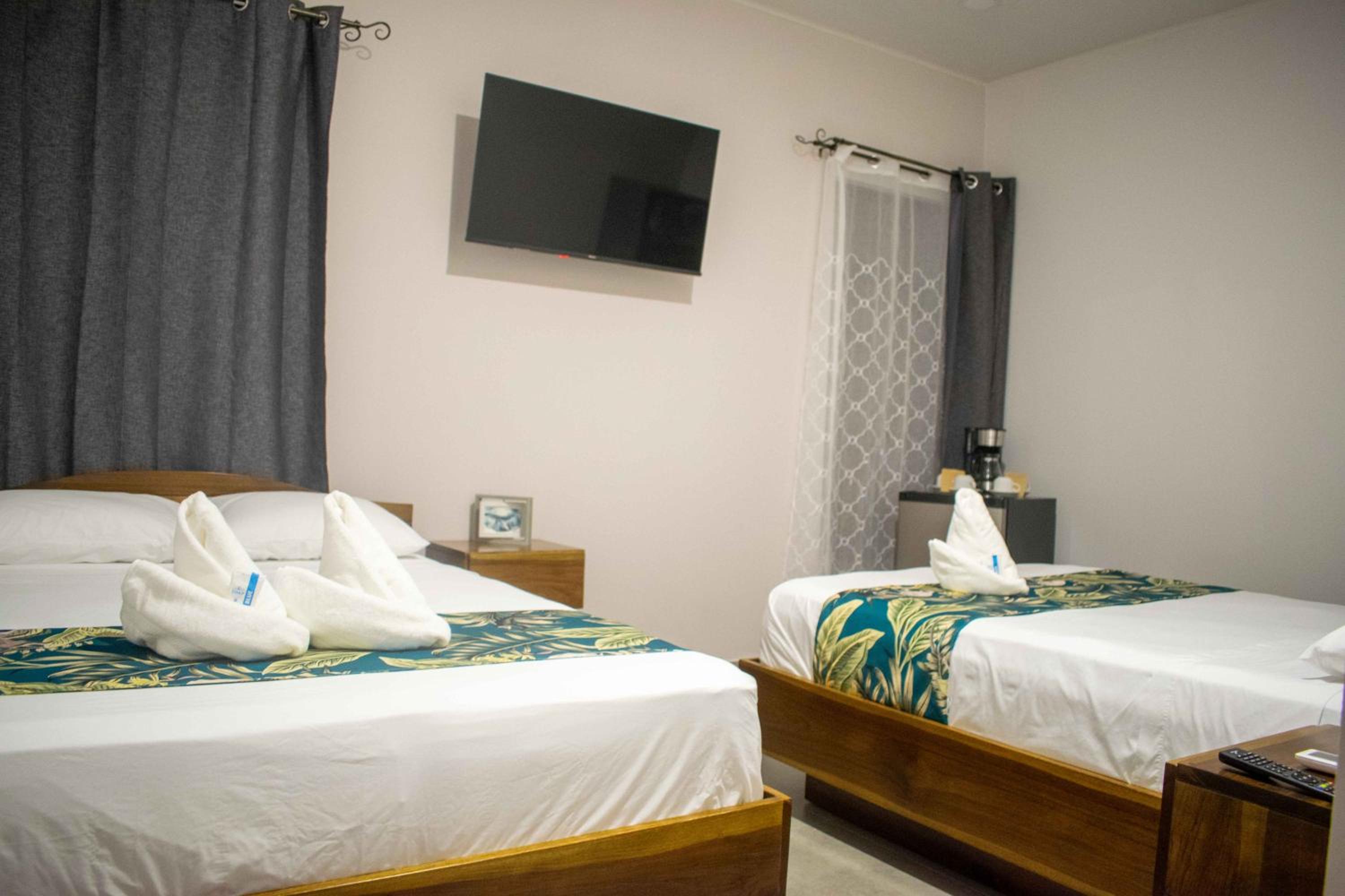Standard Queen Room with Two Queen Beds photo 1