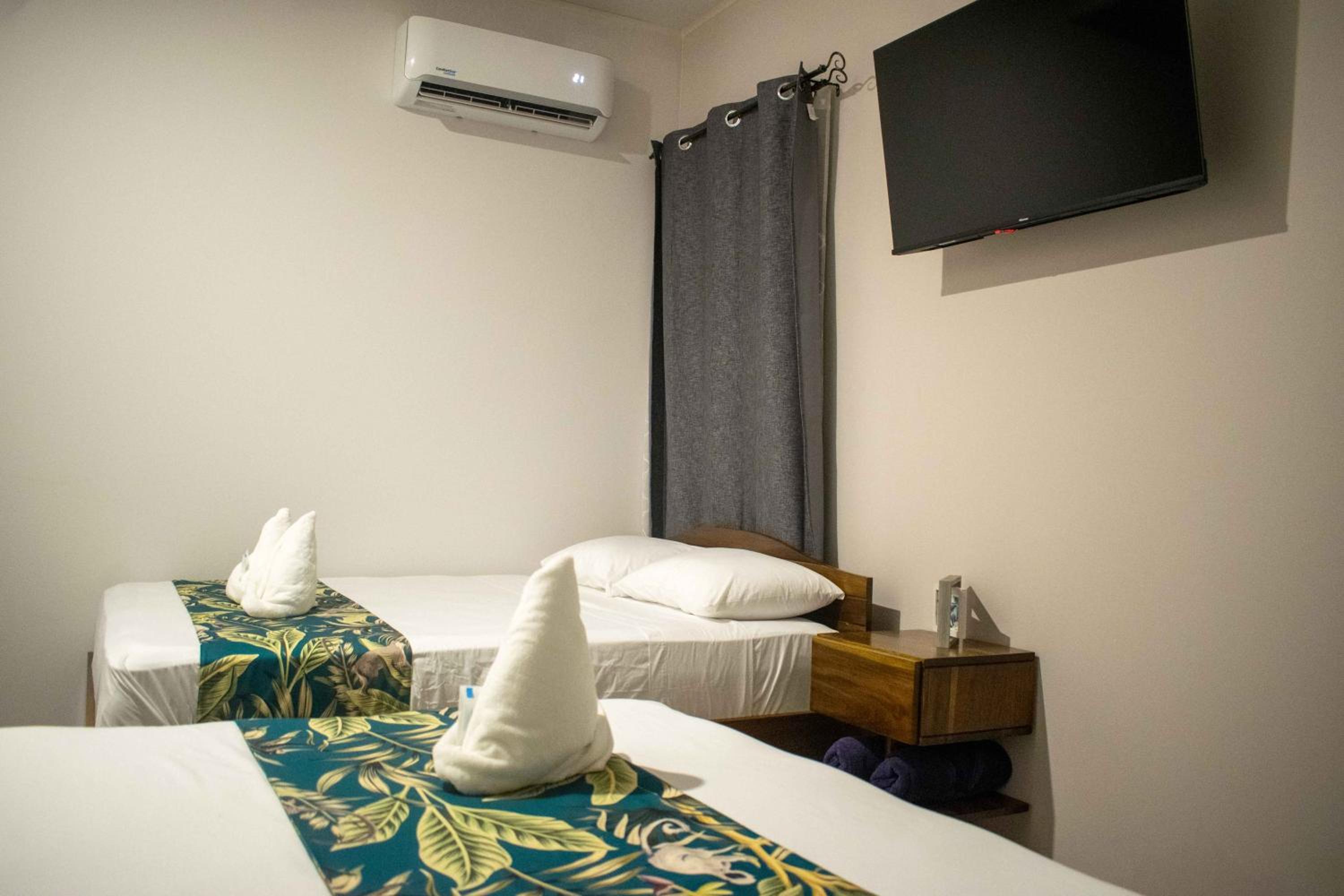 Standard Queen Room with Two Queen Beds photo 1