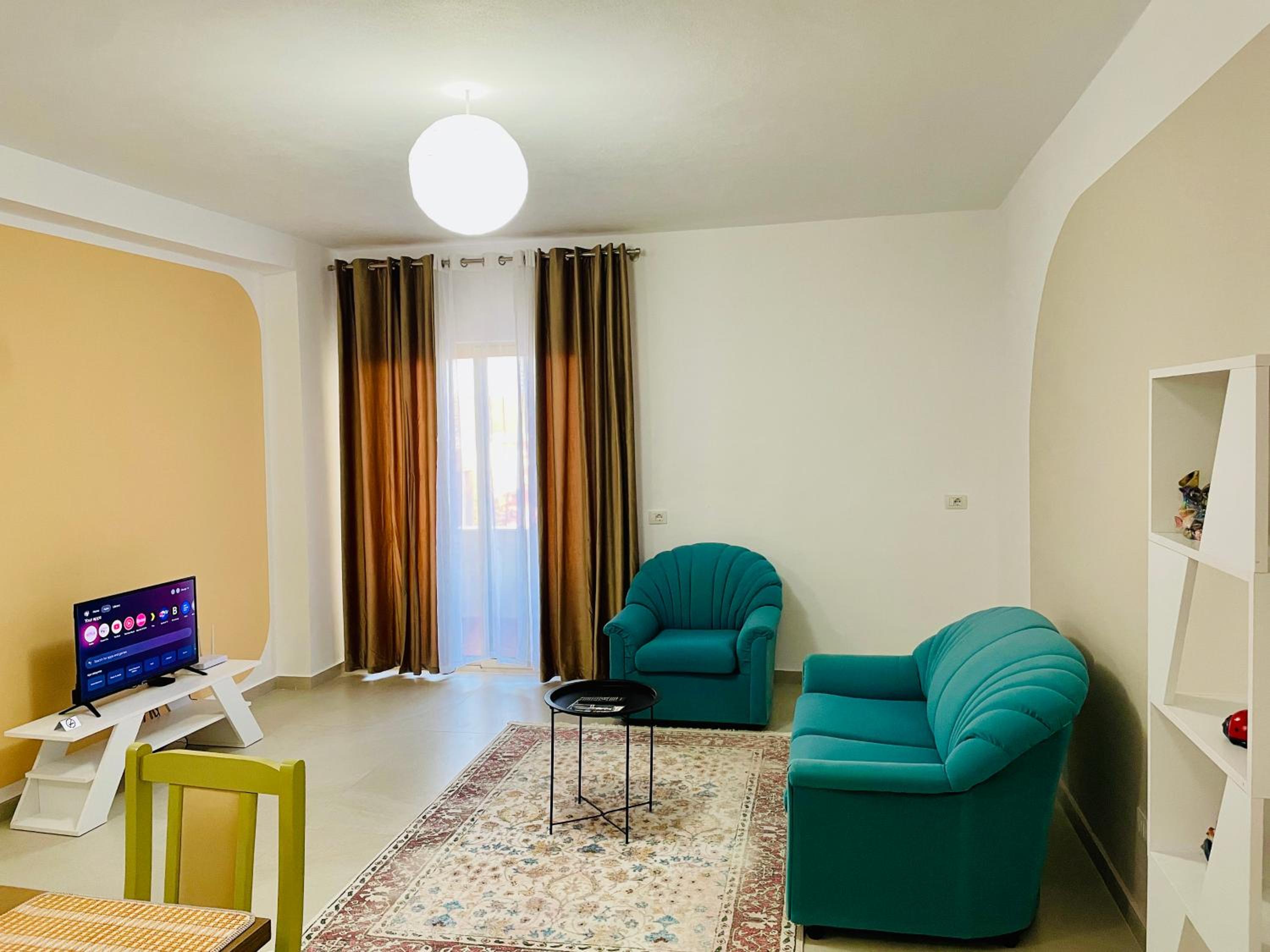 One-Bedroom Apartment with Balcony and Mountain View