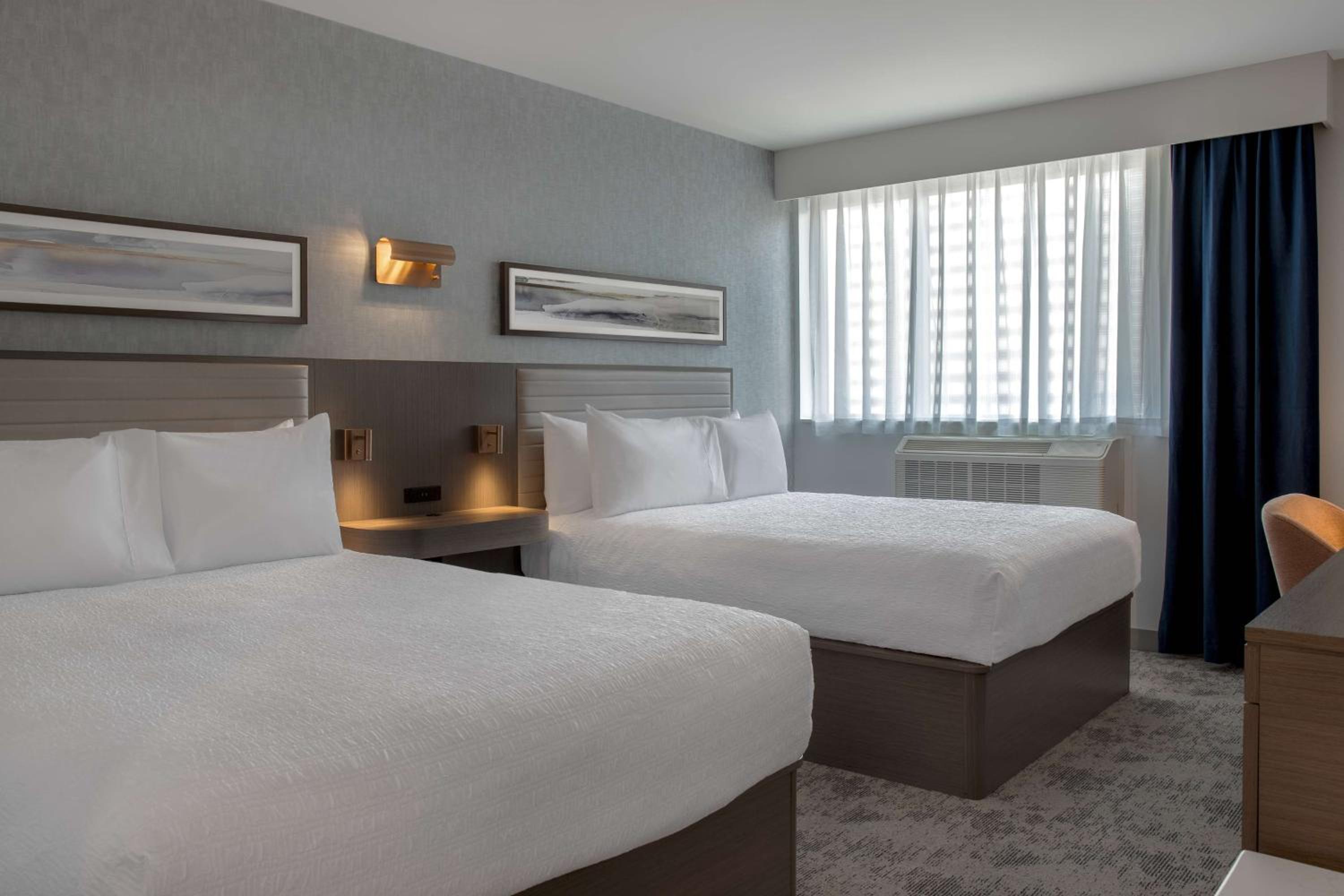 Queen Room with Two Queen Beds - Photo 1