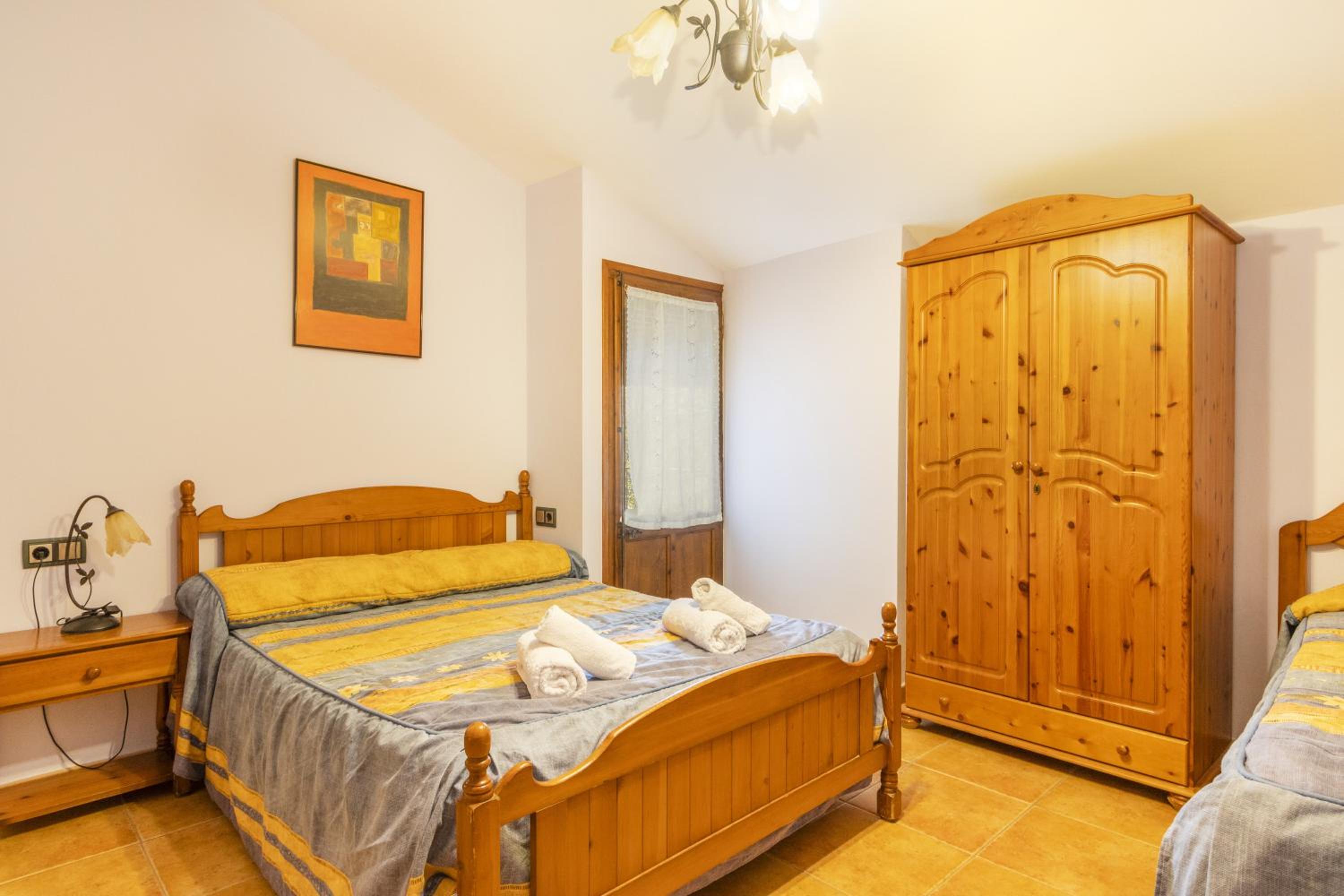 Habitación Triple con Vista a la Montaña