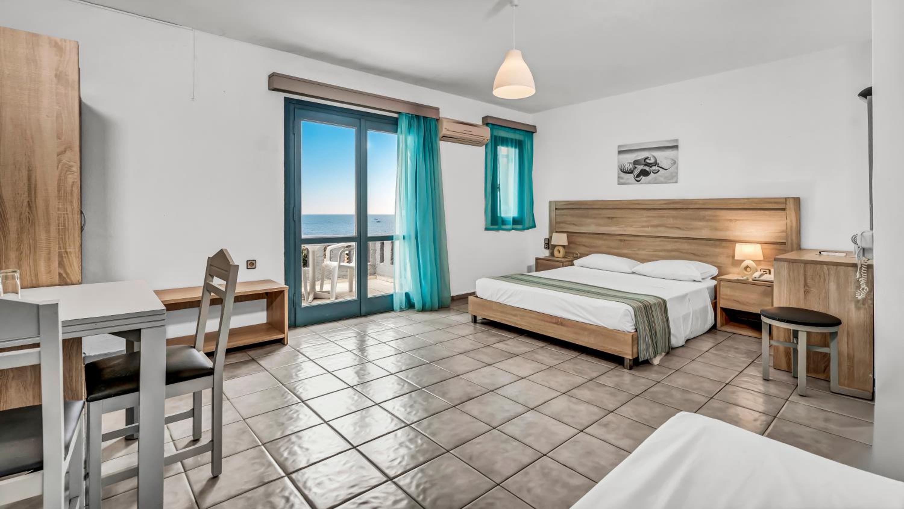 Double Room Side Sea View (2 Adults + 1 Child)