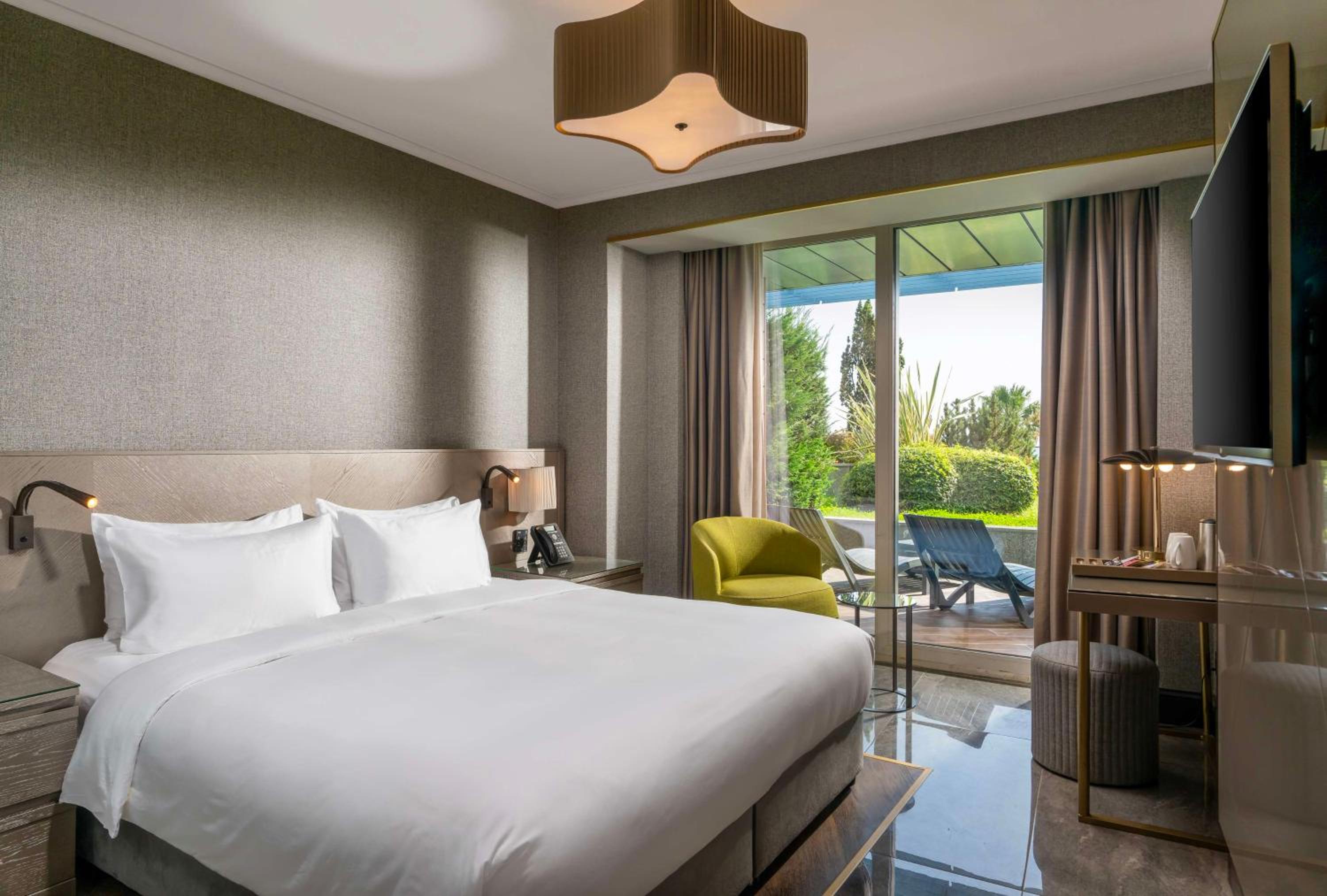 Premium Room with Balcony and Garden View