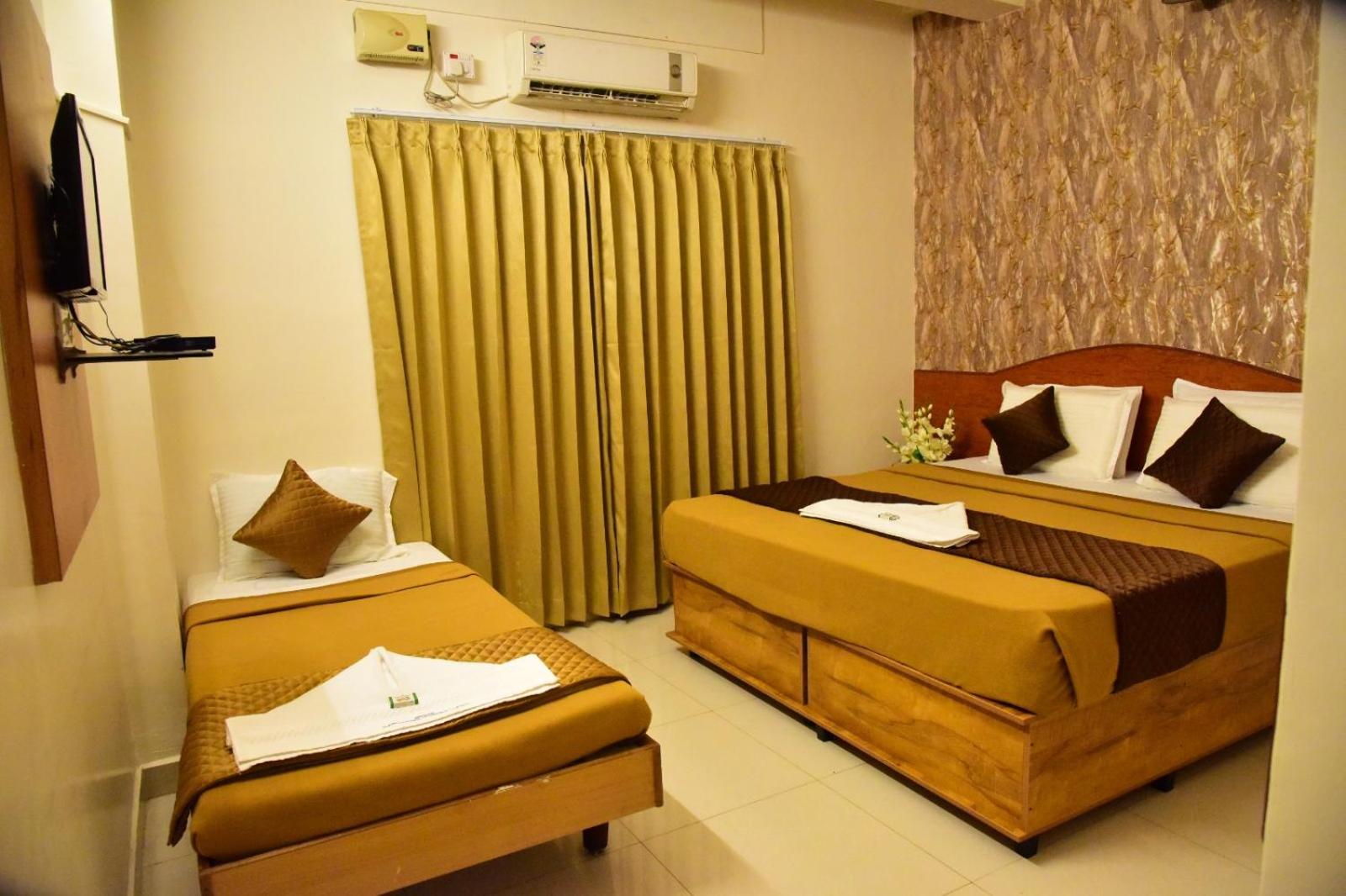Deluxe Quadruple Room - Photo 2
