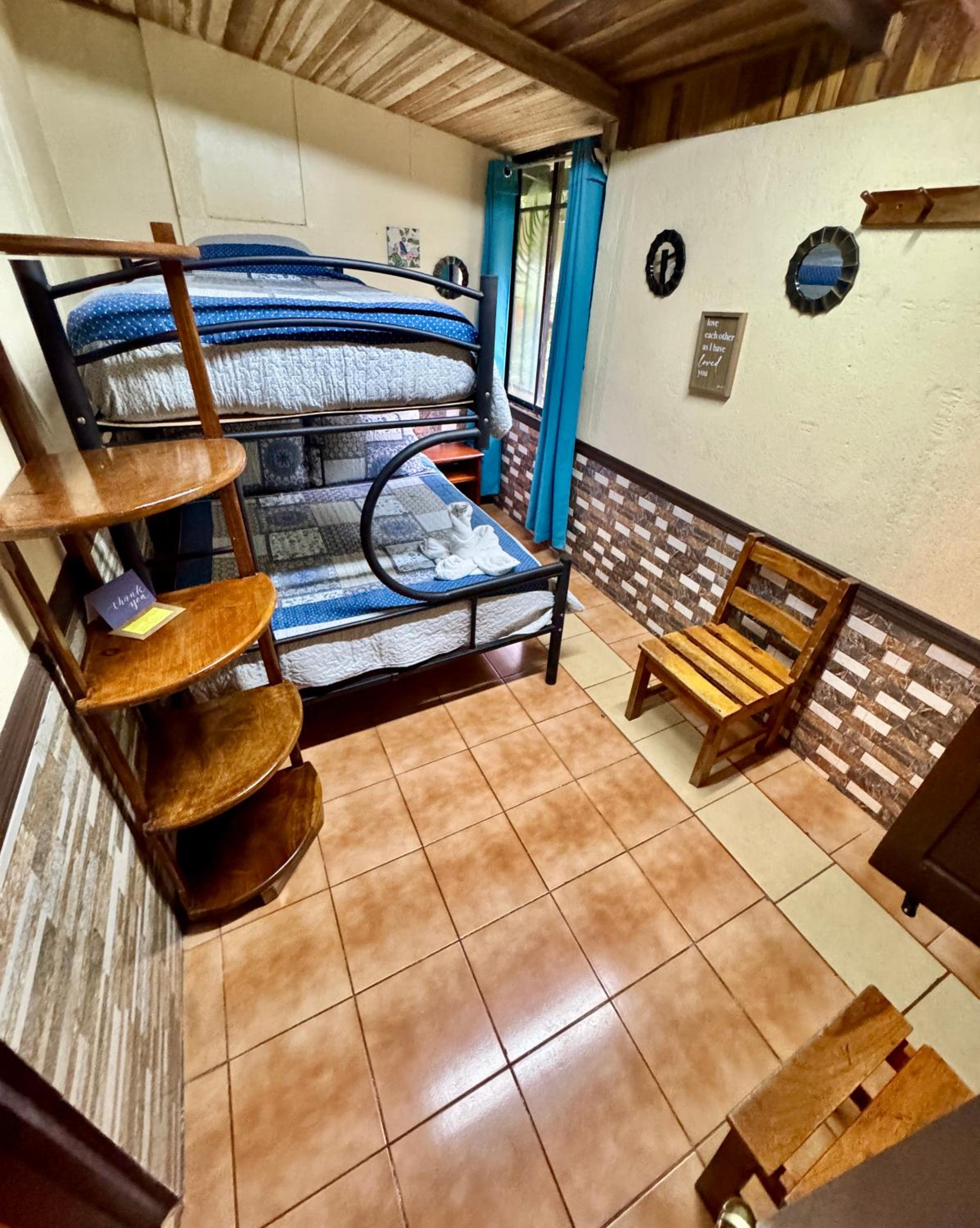 Basic Triple Room with Private Bathroom photo 2
