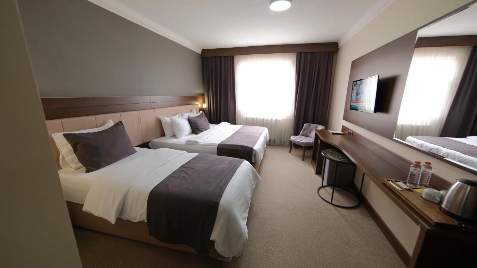 Standard Twin Room - Photo 10