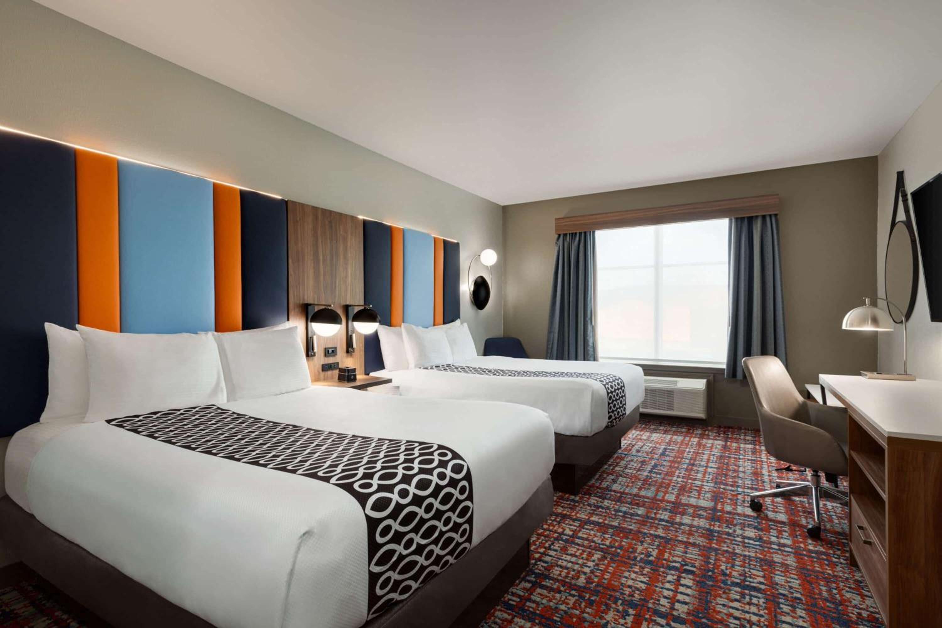 Queen Room with Two Queen Beds - Photo 1