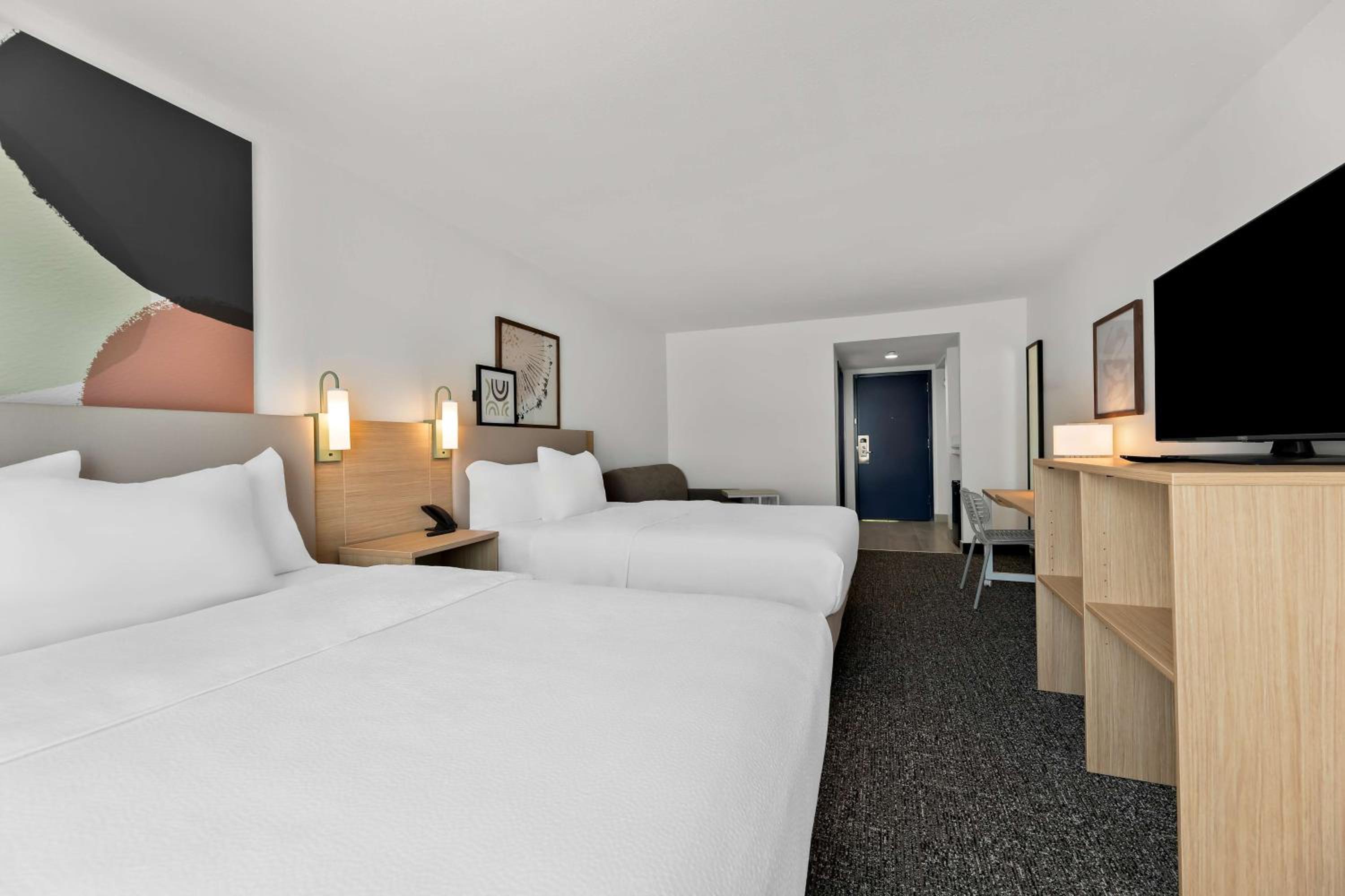 Queen Room with Two Queen Beds and Sofa Bed - Photo 1