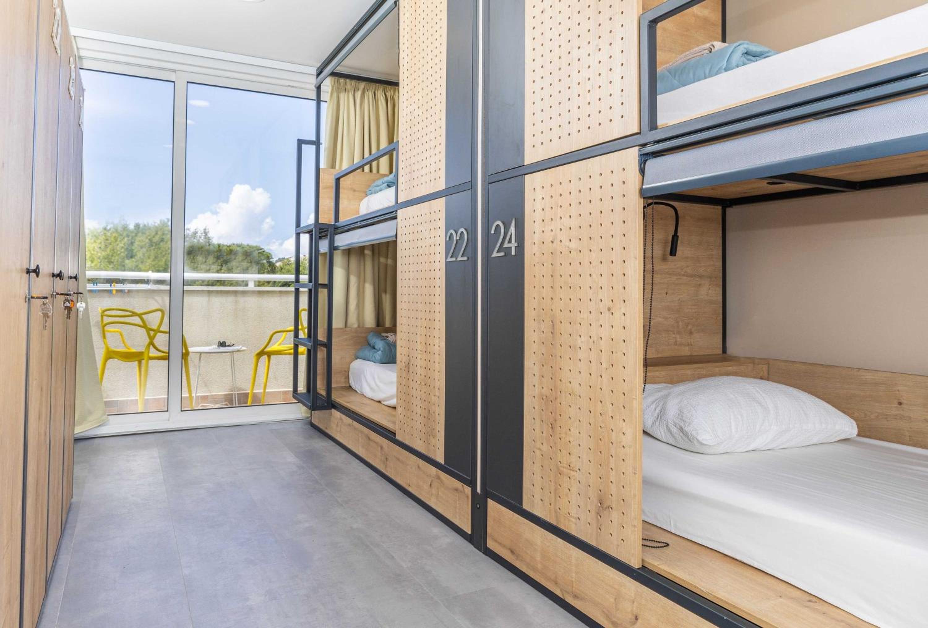 Bed in 4-Bed Female Dormitory Room with Sea View