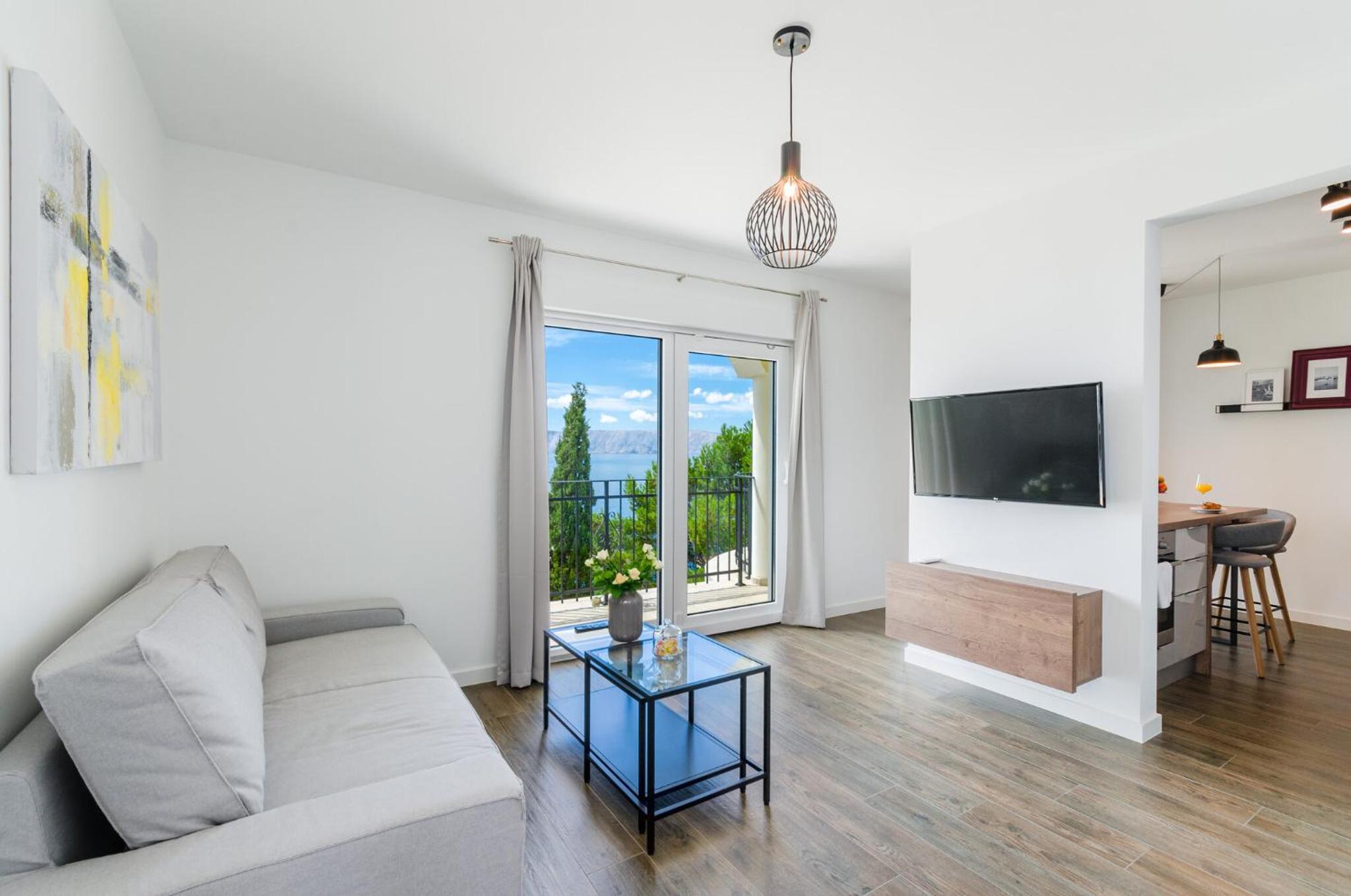 Two-Bedroom Apartment with Balcony and Sea View