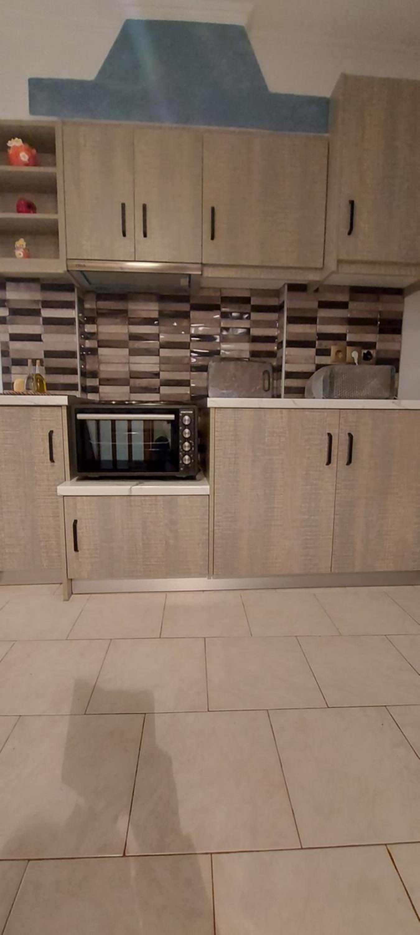 Three-Bedroom House - Photo 32