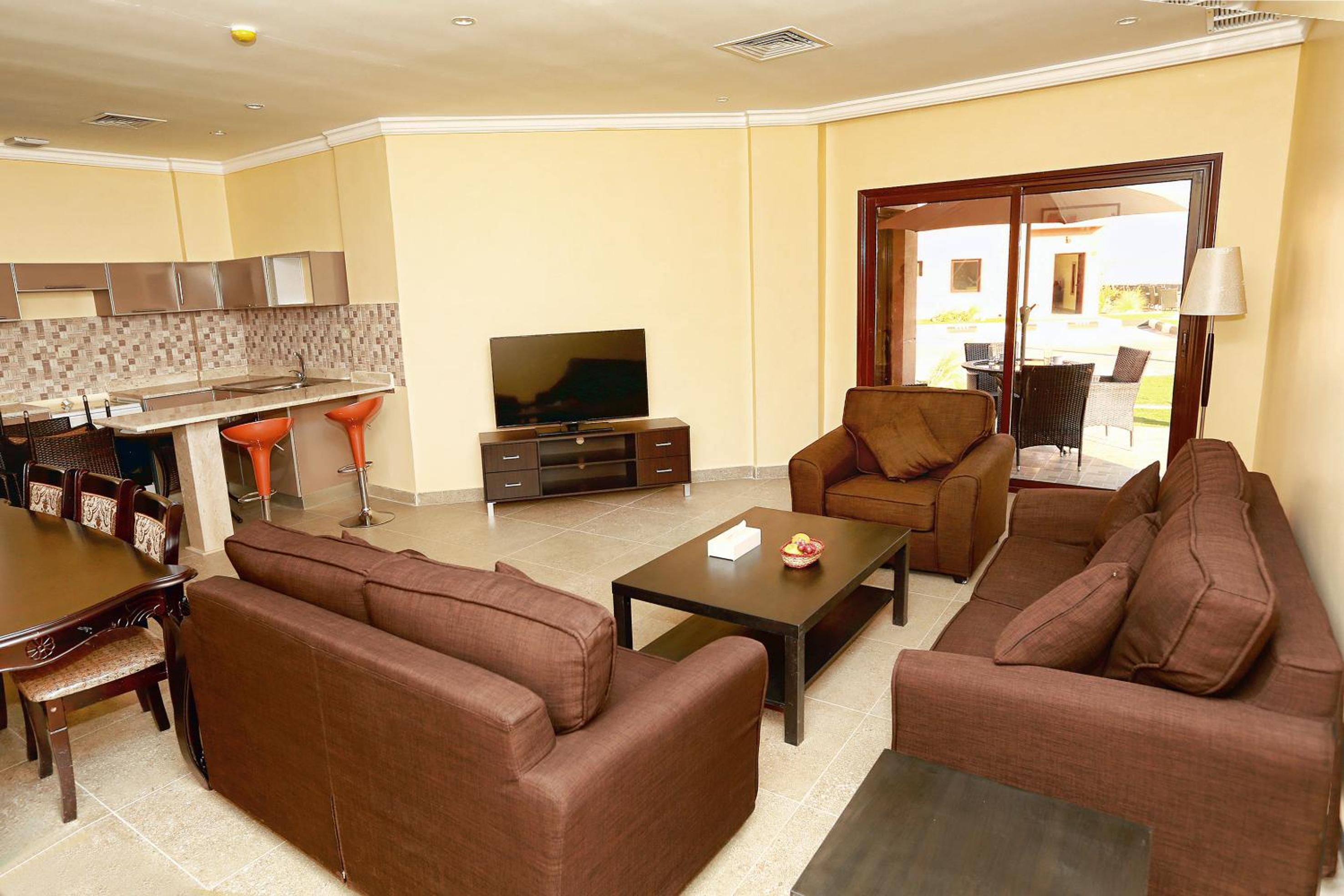 Three Bedroom Chalet - Ground floor with a Pool View and Partial Sea View