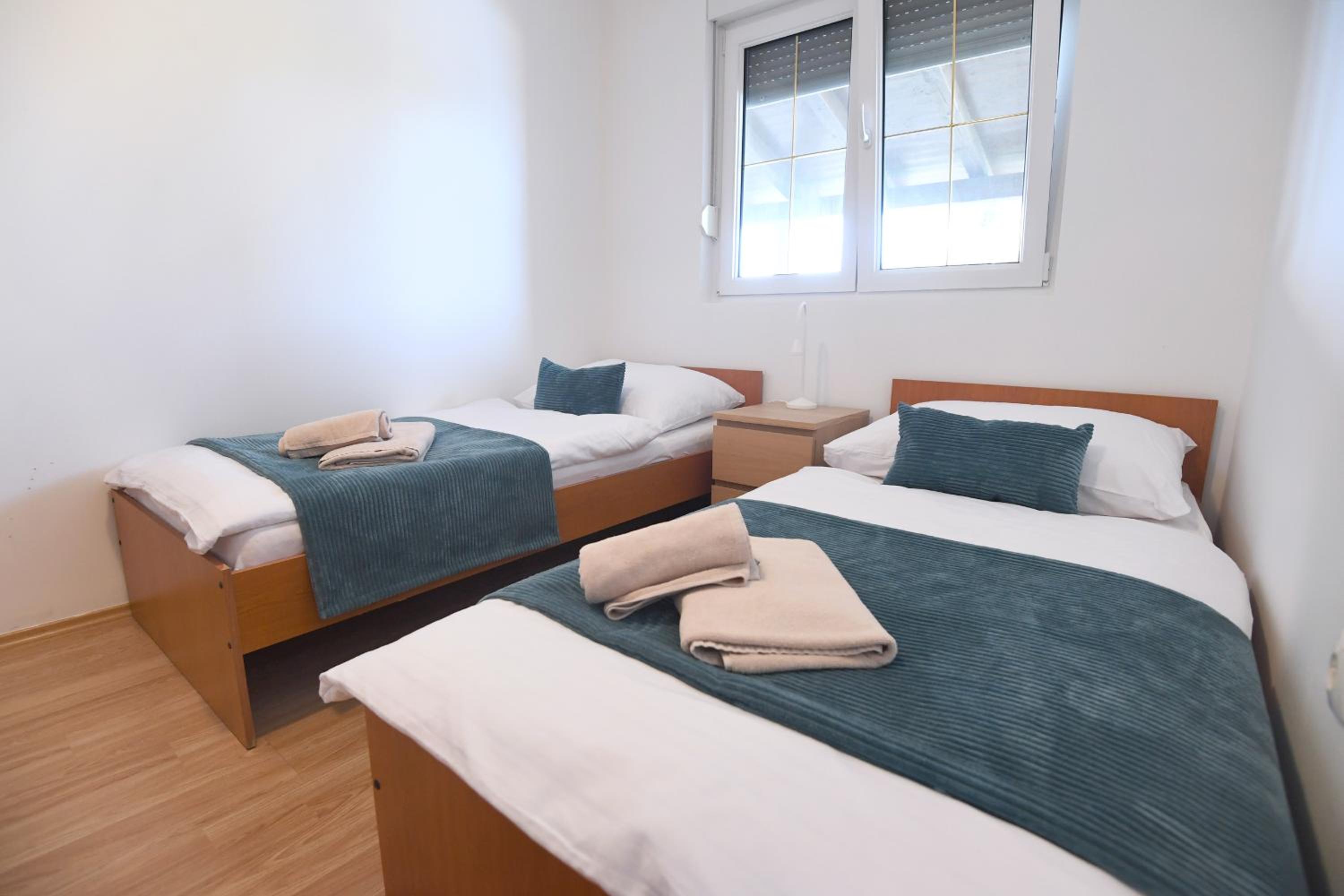 Three-Bedroom Apartment with Balcony photo 1