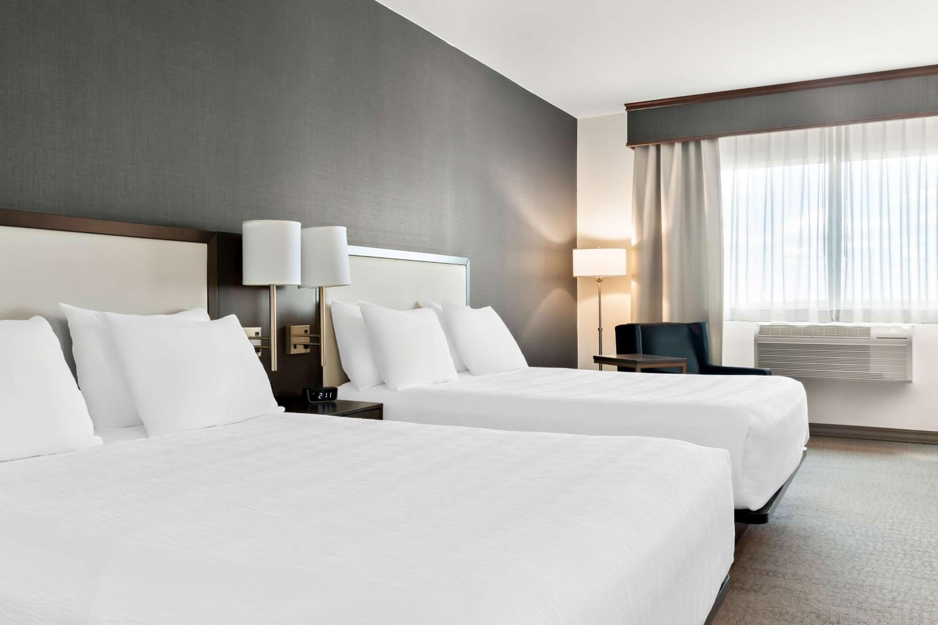 Queen Room with Two Queen Beds and Kitchenette - Photo 1