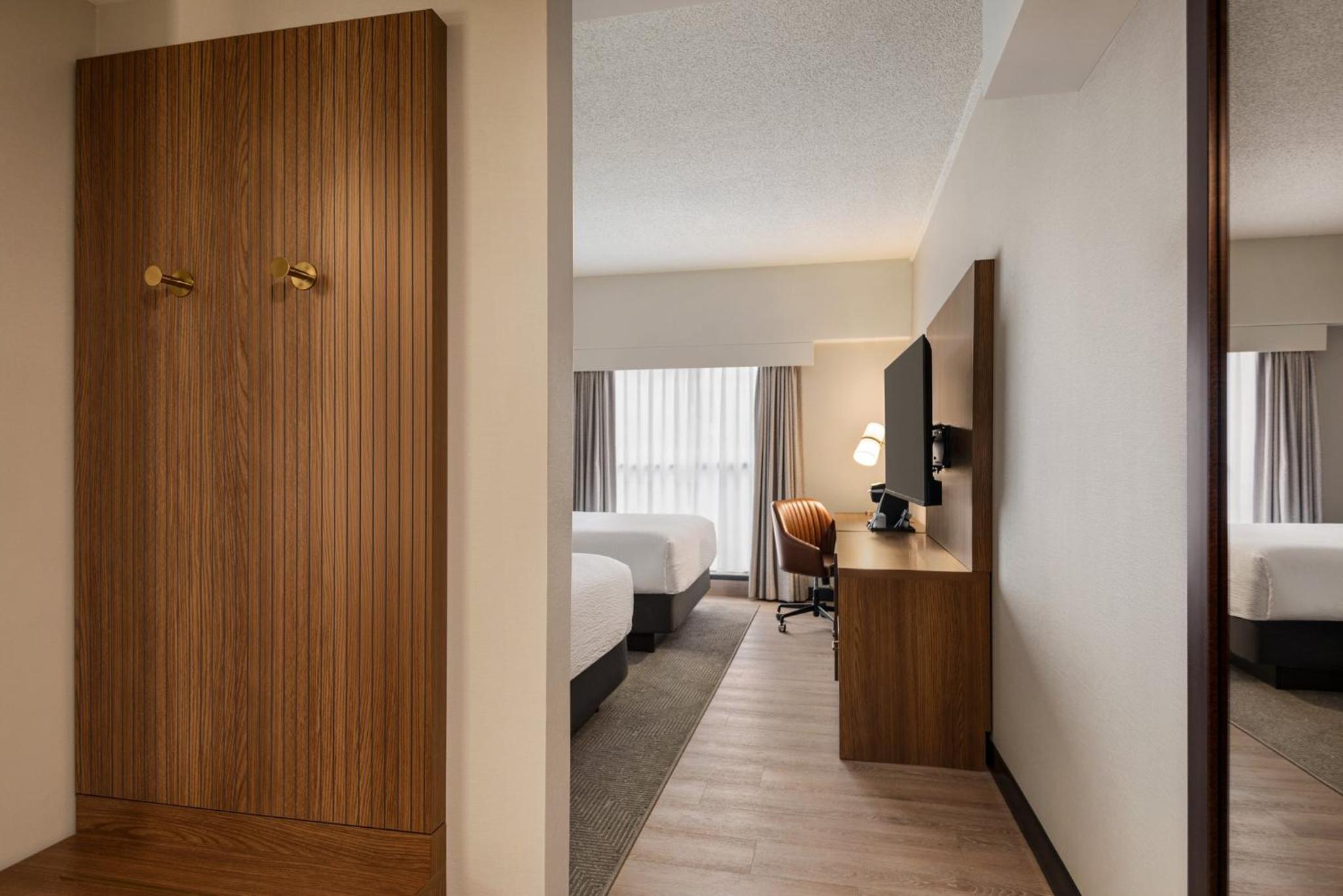Premium Queen Room with Two Queen Beds - Photo 1